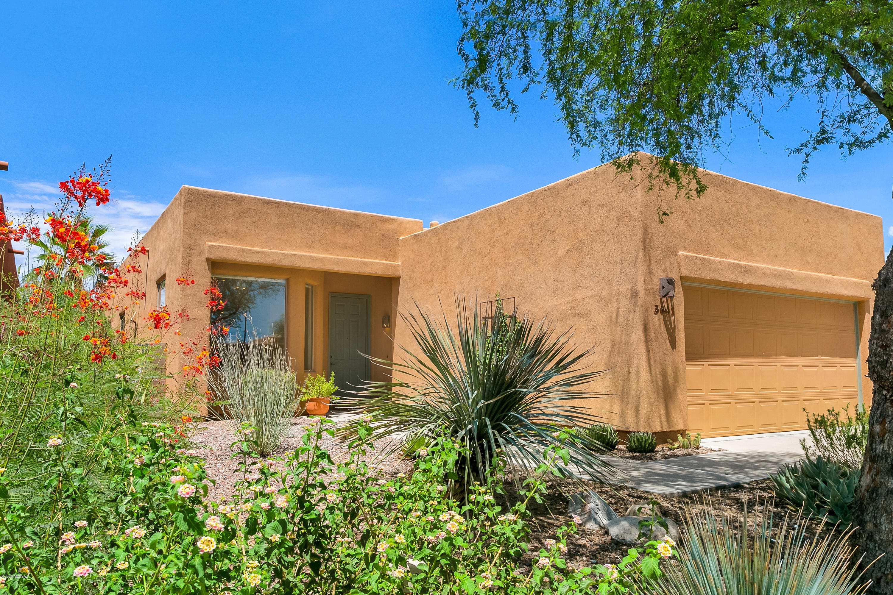 Hidden gem in Central Tucson. This home is ready for those who like to both entertain and relax with plenty of natural light and a modern design. The open kitchen is equipped with black appliances, stylish backsplash, new countertops, double sinks and breakfast nook. Air conditioning and ceiling fans ensure year around comfort. Laundry room with washer/dryer and 2 car garage. The Riverwalk is nearby with a private gate to Tucson Blvd. Close to Trader Joe's, St. Phillips Plaza, restaurants and stores. Come make yourself at home in the gated community of Lanterra.