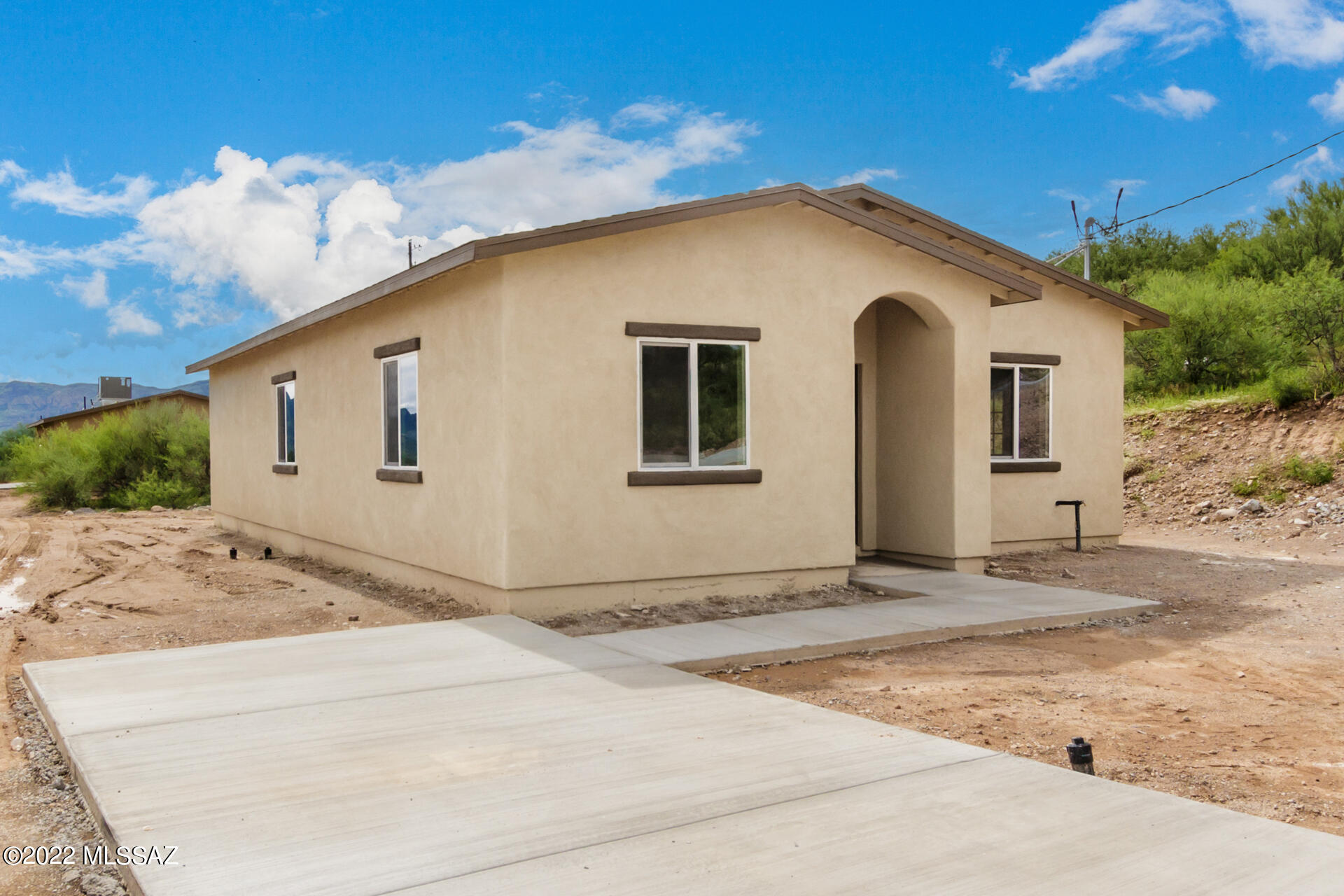 New Construction!  Come check out this charming 3bed 2 bath, 1,368 SF new home! 
Spacious open floor plan with 9 ft + ceilings.  Modern ceramic tile in every room.  The amazing kitchen features stainless steel appliances, granite counter tops and recessed lighting.  
Laundry closet inside for added convenience. 
Large master suite with an immaculate new bathroom.  Gorgeous views, near schools, shops and I-19.  Call to schedule your showing!