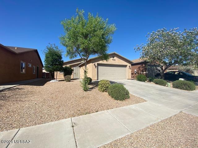 Beautiful, well-maintained property in Rancho Valencia on a quiet, dead-end street.  This neighborhood features a park within walking distance of the property.  Convenient to shopping, I-10, DM Air Force Base and everything else you could want.  The home features new ceramic tile throughout all of the living areas, and tasteful designer color paint throughout.  The open concept living room/kitchen makes it the perfect space for hosting.  The backyard is the perfect size to personalize for your own little oasis with the nice covered porch to enjoy your outdoor space in the shade.  Two car garage!  This home has a lot to offer and is truly turn-key.  Don't hesitate to check this one out before it is gone!