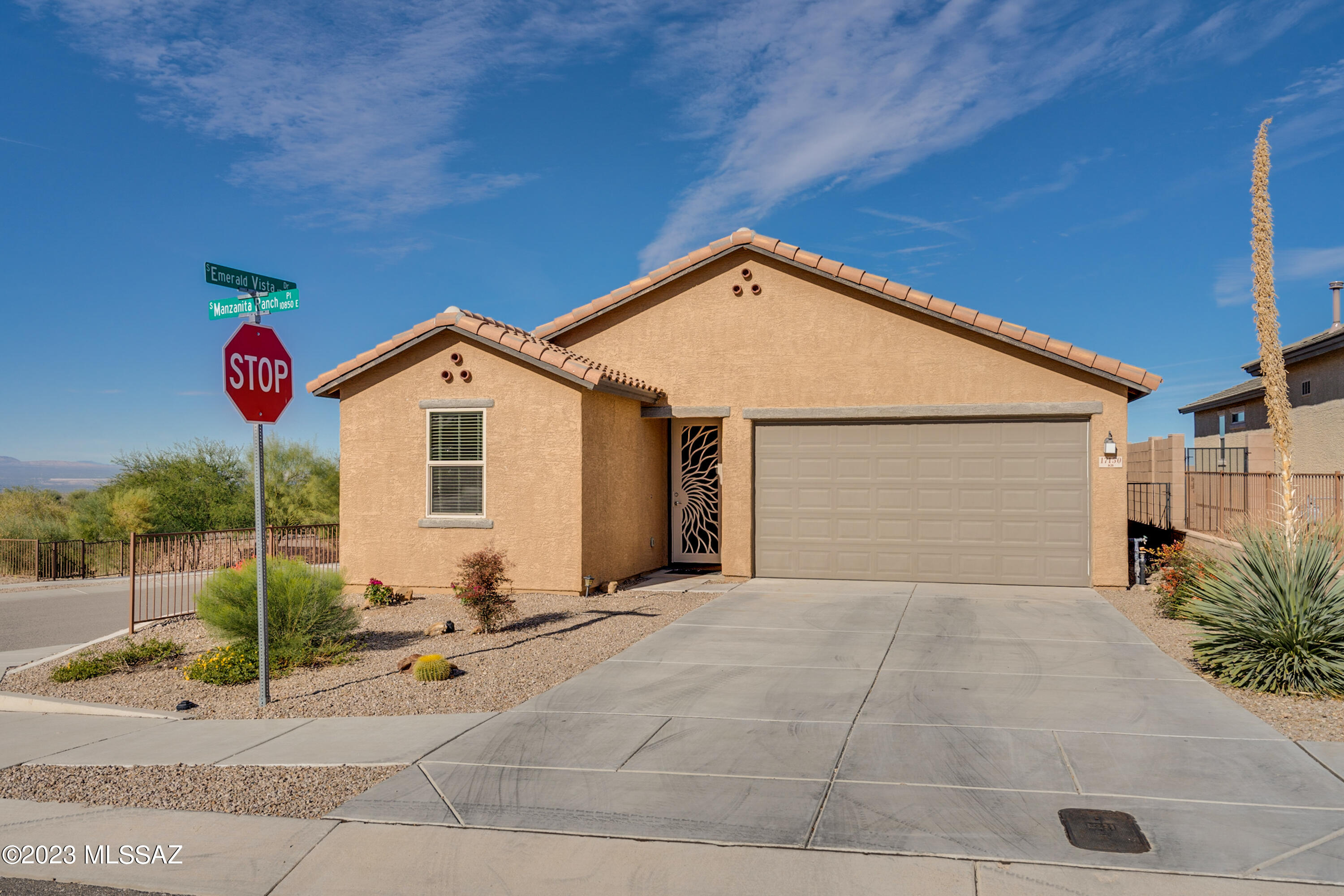 Immaculate.  Owned solar.  3BD/2BTH, split floor plan.  Kitchen open to great room.  Large kitchen island with granite, stainless appliances, maple suede cabinets, washer, dryer, fridge included.  Water softener system.  Recessed lighting and ceiling fans throughout.  Elevated lot allows for privacy and mountain views.  Clean Clean Clean...