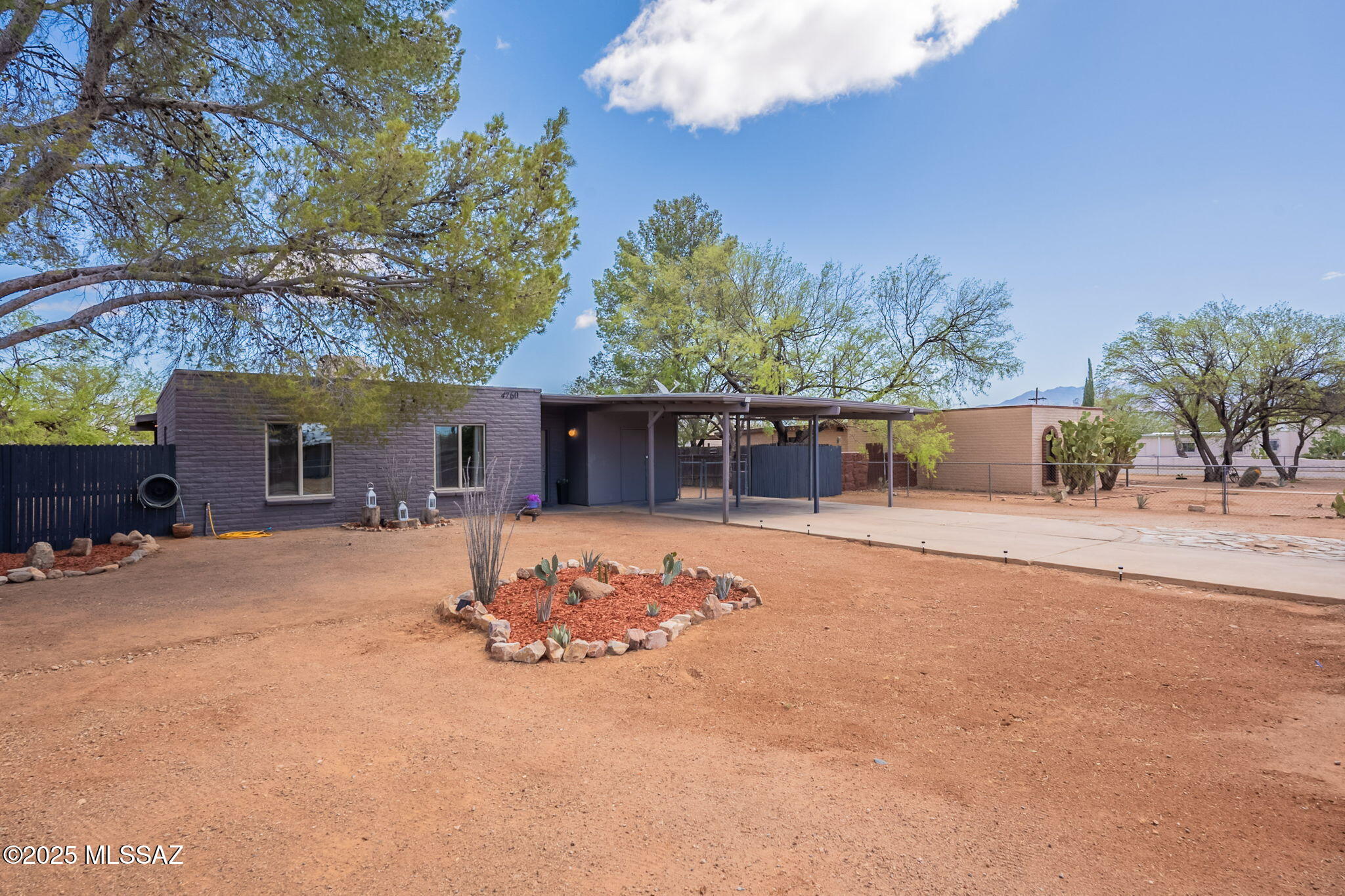 Welcome home to this 4-bedroom, 2-bathroom gem that blends timeless character with endless possibilities. Built in 1973, this well-maintained residence sits on a fully fenced 0.40-acre lot, offering privacy and plenty of room to make it your own. The expansive yard is a blank canvas and ideal for creating a lush garden, building a backyard retreat, or designing the ultimate entertaining space. Inside, you'll find a functional layout that supports comfortable day-to-day living. Whether you're ready to make it your own or searching for a promising investment, this property is brimming with potential.