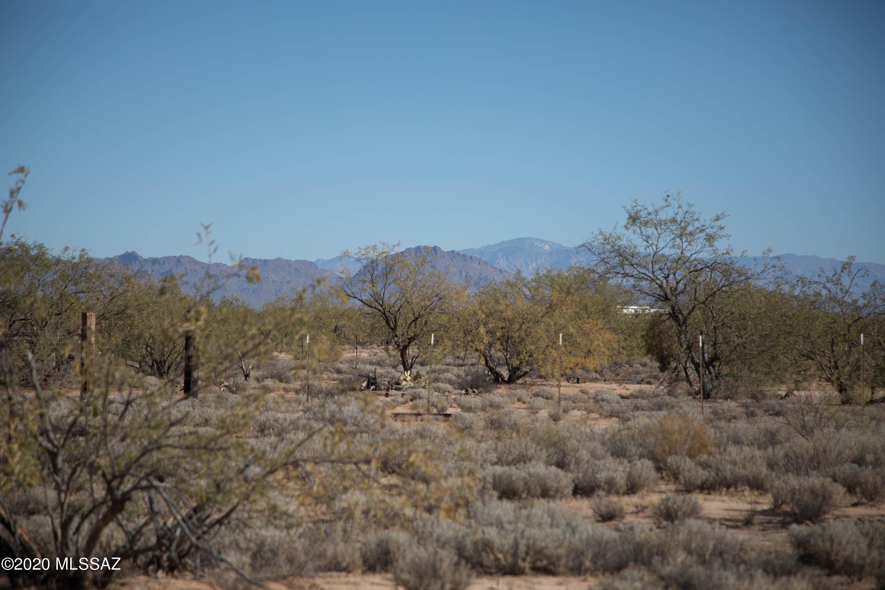 Flat 1.35 Acre lot available for your new home. This lot offers a lot of possibilities, as it is out of the city, but only minutes to get back to town and only 1/4 mile off pavement. Beautiful mountain views can be seen to your north and east.