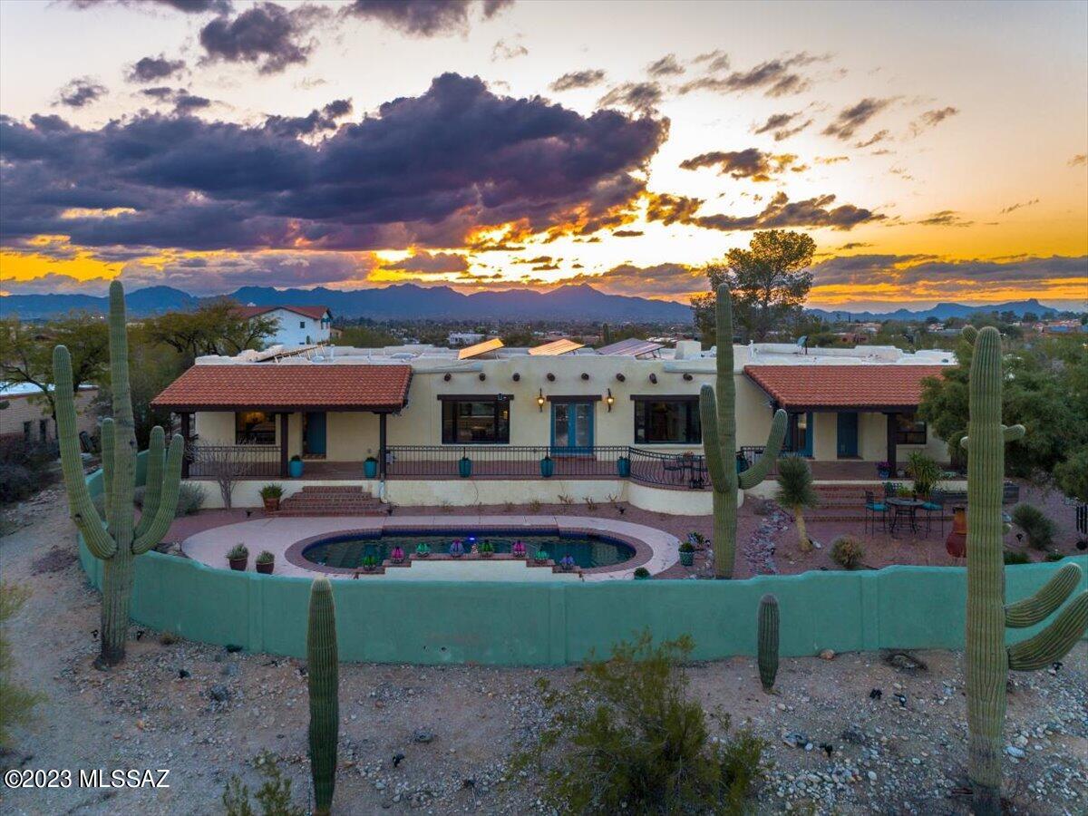 Spectacular views, stunning setting with lots of privacy. This beautiful Southwestern style home has been updated with just the right touch of modern accents, stunning tile work, updated technology, solar shades and paid for solar. Kitchen has all new appliances, bathroom have been redone, custom front door is just a short list of the updates. This is a must see!