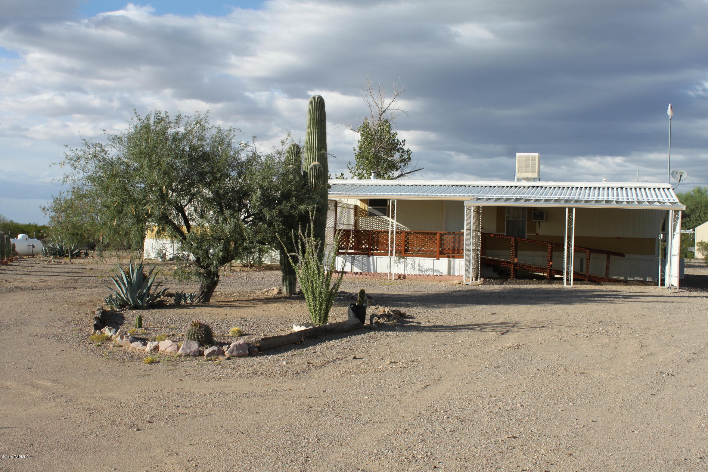 This one acre property has many possibilities. Front & Back porches to enjoy Mountain & sunset views. Home has two master bedrooms split floorplan. Come see