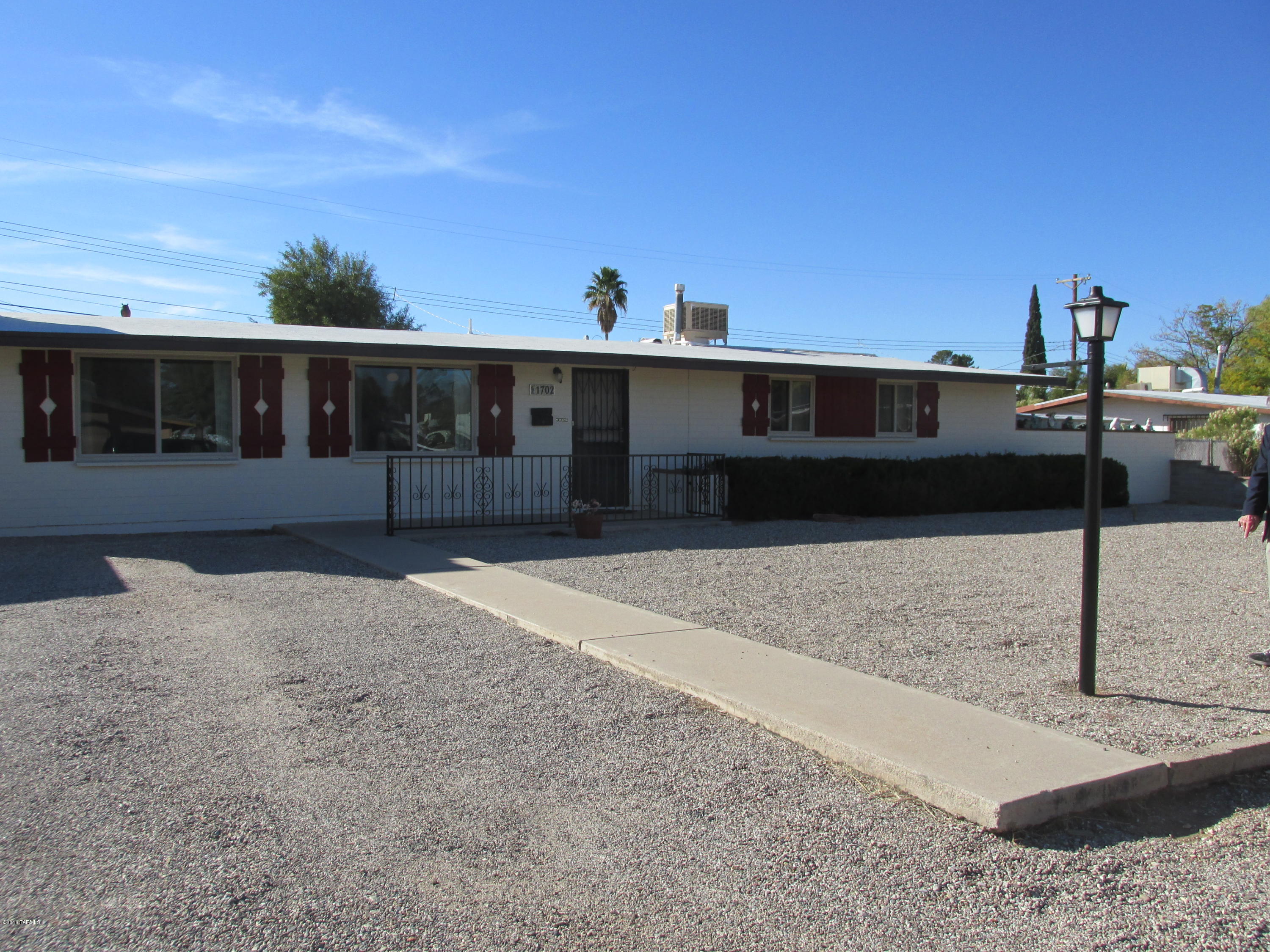WHAT A GREAT HOUSE!!! VERY SWEET 4 BEDROOM, 2 BATH HOME IN TERRA DEL SOL. ORIGINAL OWNER. HAS SO MUCH CHARM IN A NICE NEIGHBORHOOD. JUST A FEW HOUSES FROM ELEMENTARY SCHOOL.  SO MUCH TO LIST, YOU REALLY HAVE TO SEE TO APPRECIATE.  LARGE LIVING ROOM WITH FIREPLACE AND BUILT IN SHELVES.  BUILT IN CUSTOM CABINETS IN DINING AREA, FAN, AND CUTE OAK RETRO KITCHEN WITH TRACK LIGHTING AND CORIAN COUNTER TOPS. EATING BAR. DUAL PANE WINDOWS & SLIDER. WINDOW DRESSINGS STAY. NEWER FRONT BATH & BRAND NEW 3/4 MASTER BATH REMODEL. NEW PAINT INSIDE & OUT. NICE COVERED PORCH, GOOD SIZE WORKSHOP, LARGE BACK YARD, EASY CARE FRONT YARD WITH PLENTY OF PARKING. GO SEE, SHOW AND SELL. YOU WILL LOVE IT.