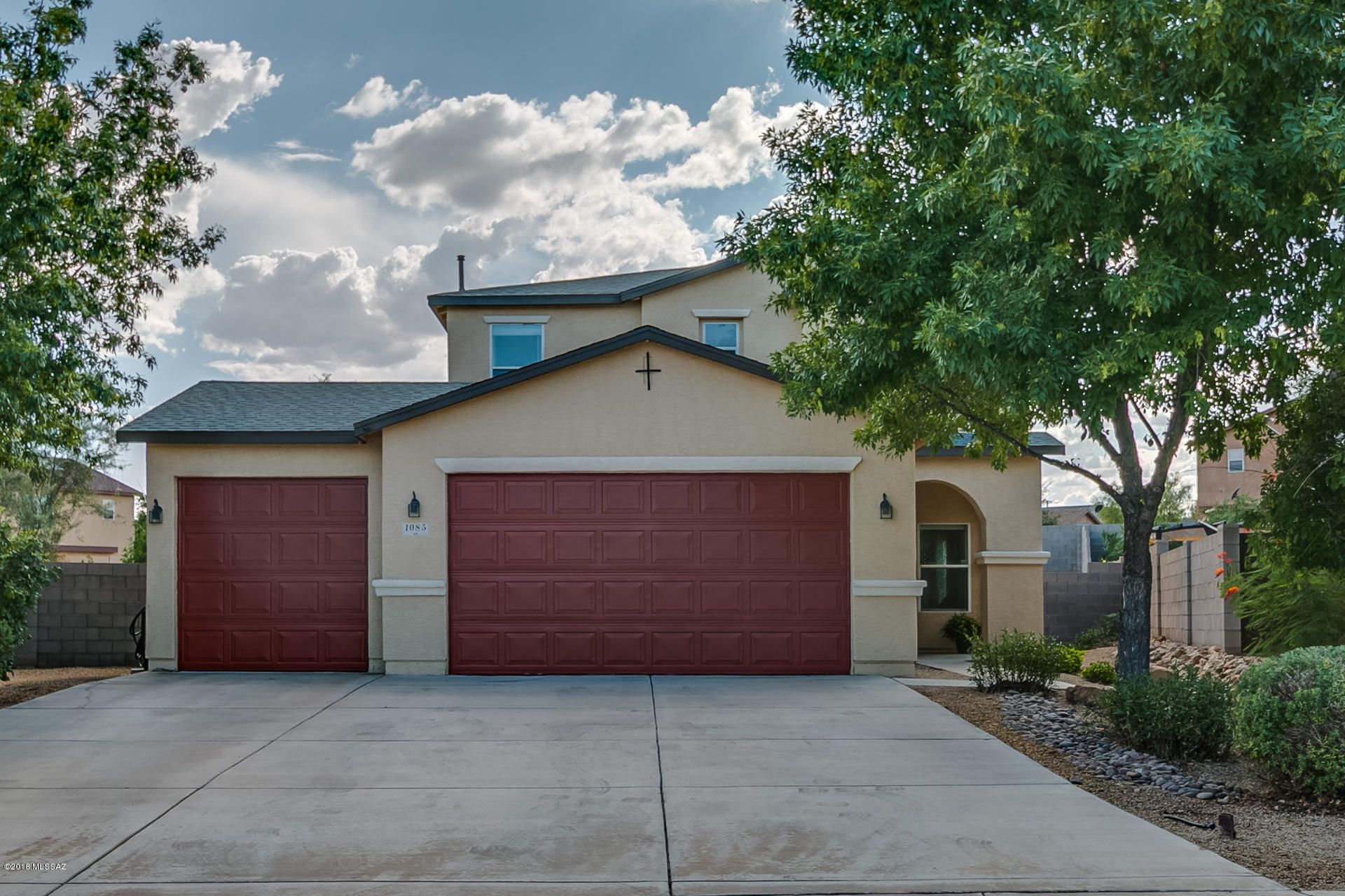 Welcome to One of a Kind Oasis in Sahuarita!! This beautiful 2 story home offers 4 bedrooms/2.5 bath with 3 car garage sitting on 1/4 acre lot. Amazingly maintained by the original owner with great pride of ownership. Many great details such as 8 ft entry door, 9 ft ceiling 1st floor and open kitchen with expansive granite counter top island, upgraded carpet, upgraded cabinetry, some plantation shutters, and much more. Much landscaped rear yard with natural grass, fire pit, separate dog run, mature trees and fruit trees. Treat yourself with sweet apples while you are relaxing in the rear yard not to mention pebble tec pool for you to jump right in after hot days!! This home is a true jewel and make it yours by visiting it today!!