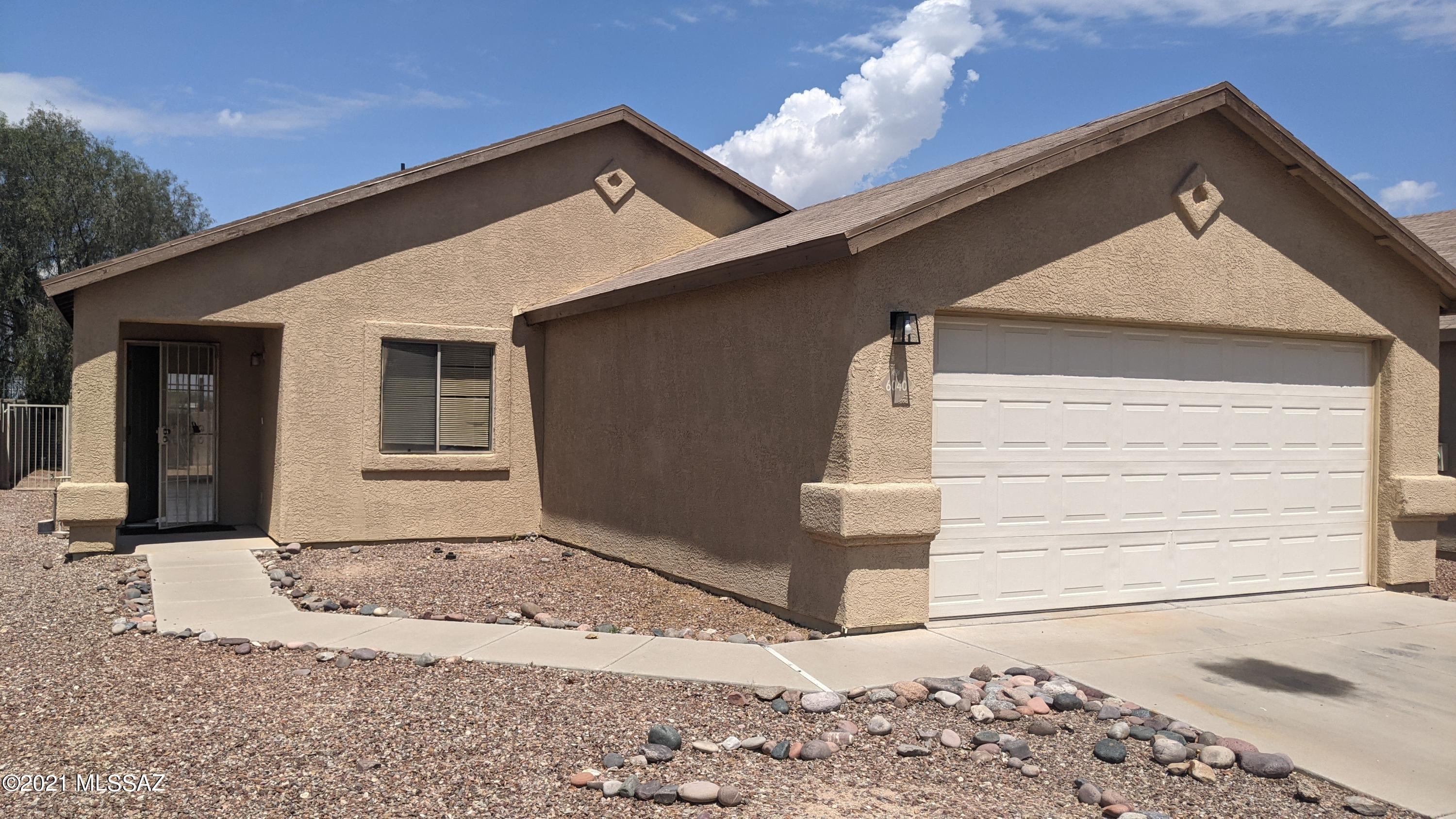 Well kept 3 Bedroom 2 bath home.  Painted slab floors throughout.  Vaulted ceilings.  A/C.  2 car garage.  New roof.  Located near schools and transportation. Perfect starter home.