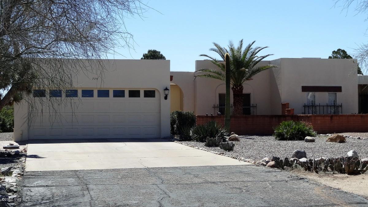 Prime Location! This end unit townhouse has wonderful views of the Santa Rita Mountains. Townhouse is surrounded by acres and acres of lush desert with walking paths. This well maintained home has a wood burning fireplace for the cool evenings. The kitchen with newer appliances has a large eat in area. Exterior of home was painted in 2017. The roof was double coated end of 2016. New hot water heater installed 2016, along with new toilet installed 2016. The two-car garage has tons of storage cabinets. You will enjoy this centrally located quiet location. Don't miss seeing this comfortable, fully furnished clean home.