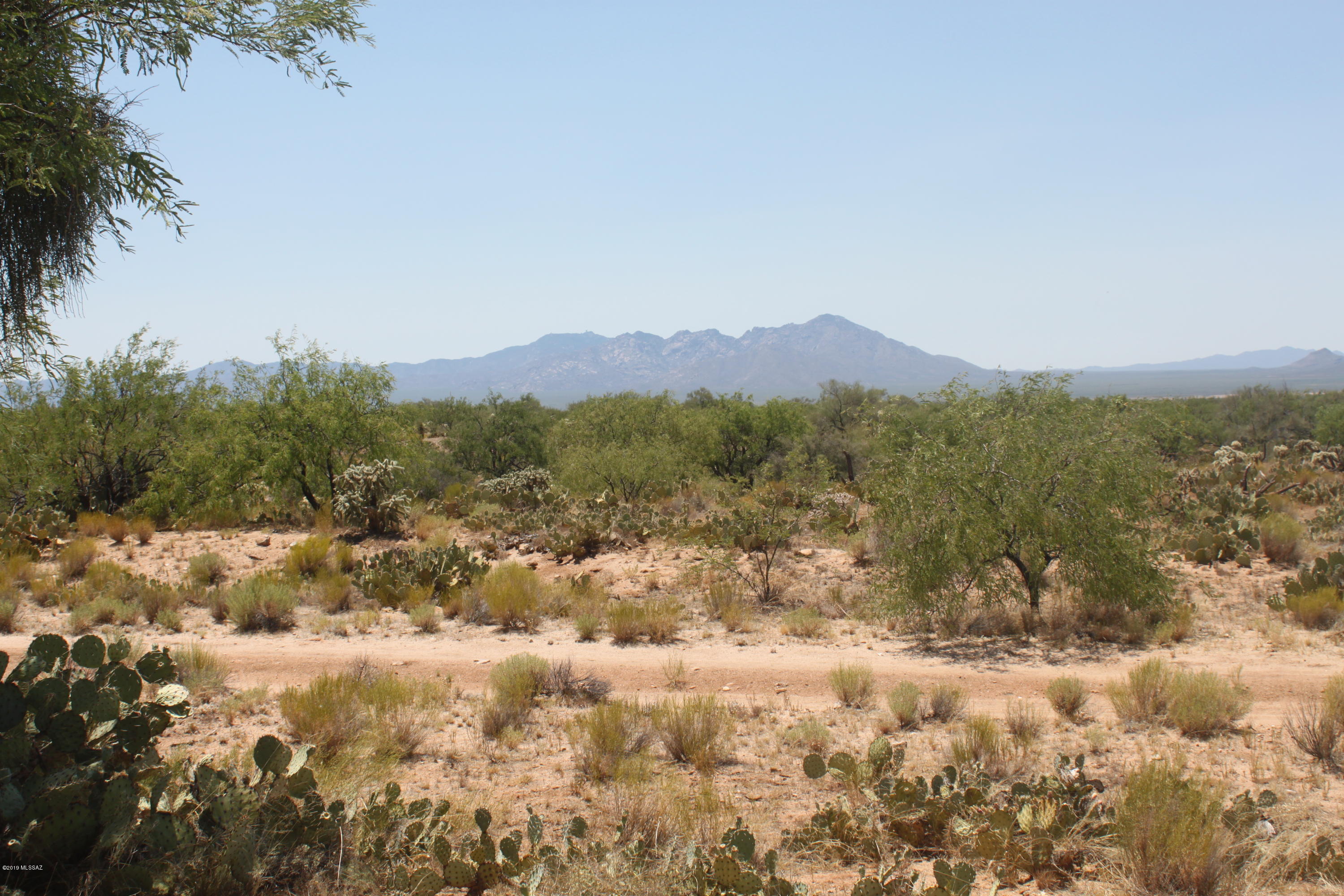 One acre lot in the Sonoran Desert with beautiful mountain and sunset views. Get away from the hustle and stake your claim at an affordable price. 2 more lots adjacent to this one are also for sale. Buy one or take all 3 for $10K.