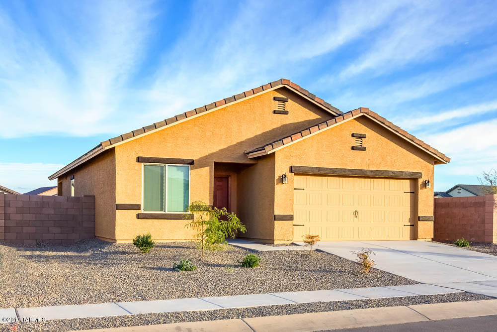 The Ajo floor plan is a spacious 3 bedroom, 2 bath single story home with over $10,000 in upgrades including energy efficient kitchen appliances, granite countertops, custom wood cabinets, brushed nickel hardware and an attached two car garage. Each of these beautiful homes comes fully-loaded with a private master suite complete with a walk-in closet, as well as a fully fenced backyard, large covered patio and front yard landscaping. This exceptional home is located within the amenity-rich community of Sonoran Ranch, featuring miles of walking trails, as well as a park with a children’s playground and a spacious picnic area, providing an extraordinary lifestyle for you and your family.