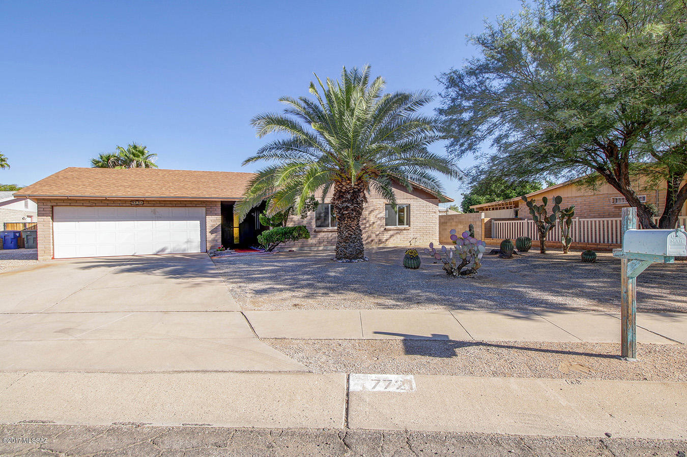Remodeled and Move-in Ready! Great Curb Appeal and Amazing Floor Plan! Separate living areas, open kitchen, 3 bedrooms, 2 baths, 2 car garage, covered porch and block wall. Kitchen boasts granite countertops, abundant cabinetry, stainless steel appliances and pantry closet. Remodeled bathrooms with tile and updated fixtures. Huge storage room in garage could be workshop or hobby room.
