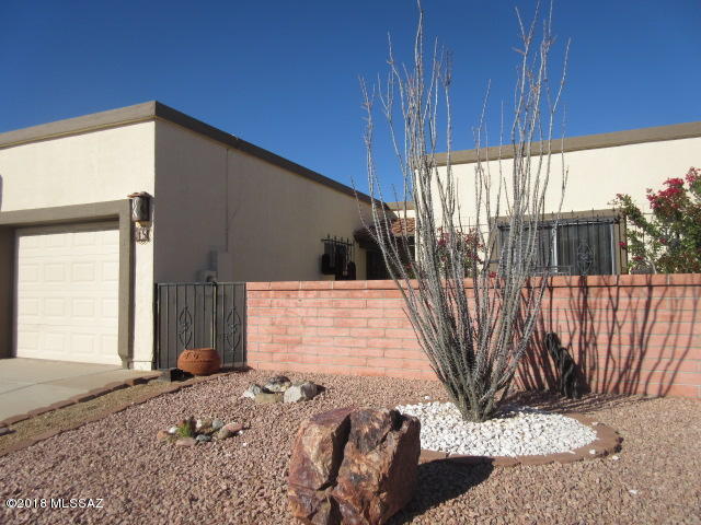 This recently updated townhouse is a end unit. Fresh paint, carpet, counter tops, light fixtures, a must see! Wonderfully maintained home, roof was done last spring. Incredible low maintenance landscaping front and back. Nice open living area, eating area in the kitchen, lots of storage throughout the property. One of the few in this neighborhood with a garage.