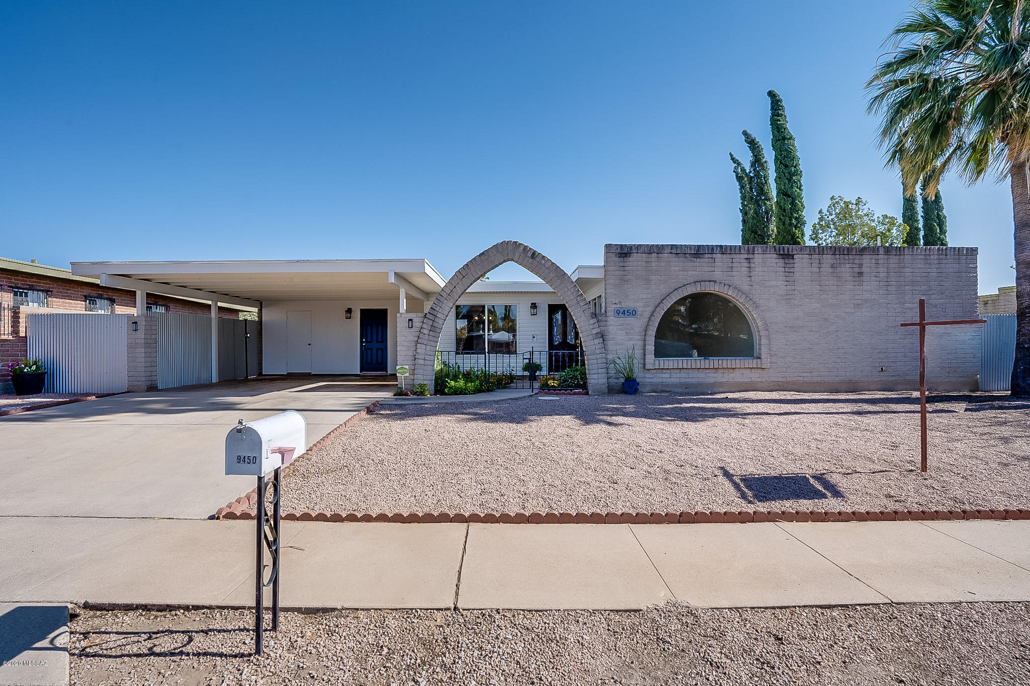 First time ever on MLS! Come check out this amazing fully remodeled, 4bedroom/ 2 bath home.   This home is open and cheery with great entertaining spaces both inside and outside.   It has a formal dining room and living room plus a warm family room that leads to the backyard.  The backyard is beautifully landscaped with artificial turf, a relaxing conversation area and gorgeous mountain views.  This lot is very desirable because there are no neighbors behind you...just breathtaking mountain views!  Included in this sale, is a 17 ft. aquatic training vessel lap swimming pool.   It is made by Marques and is heated for year round swimming or training.  The kitchen has all new stainless steel appliances.  Washer and dryer are also new and convey with sale.