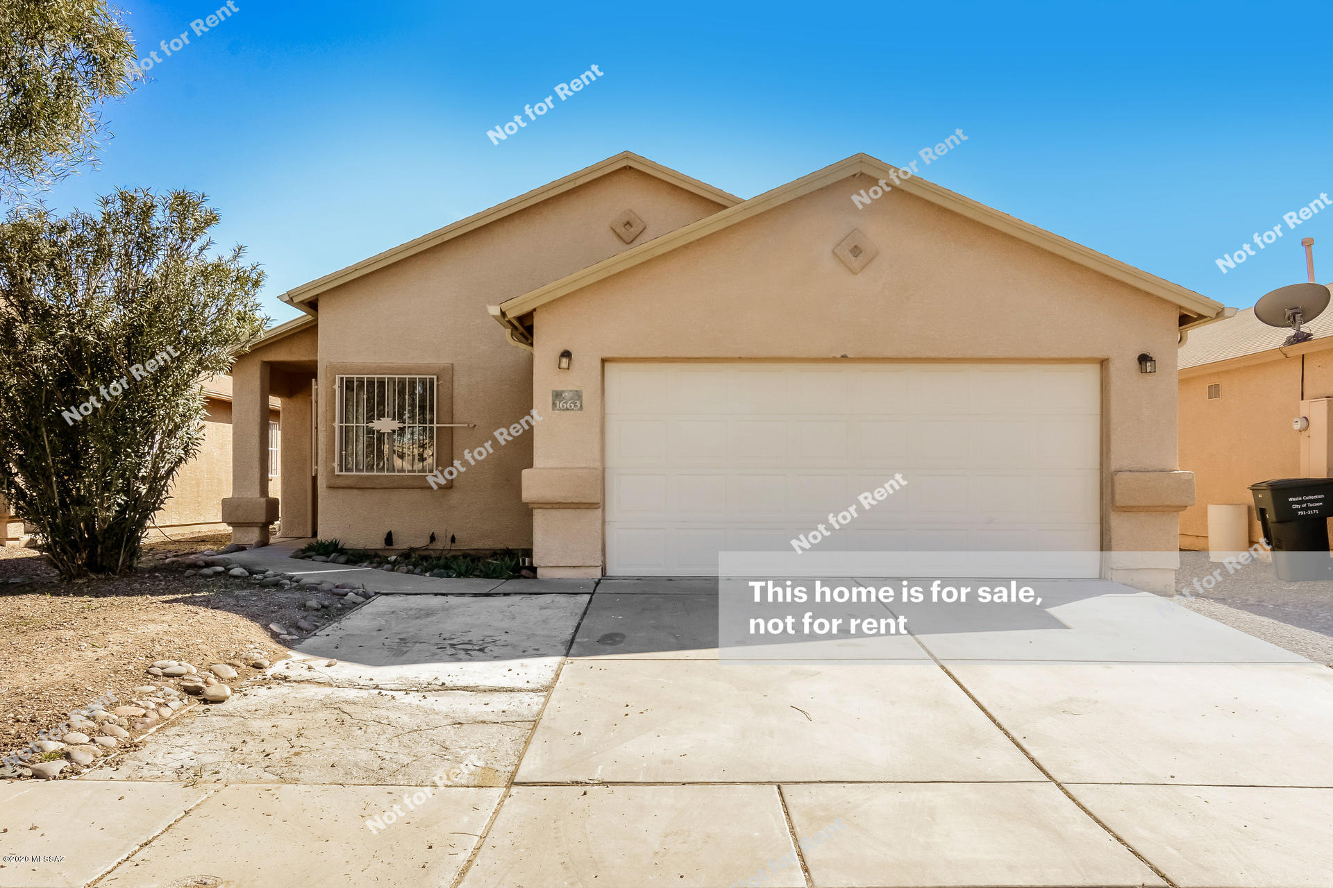 This one-story Tucson home offers vaulted ceilings, laminate and tile flooring, an island kitchen with a breakfast bar and a gas stove, a master suite with a step-in shower in the private bath, and a two-car garage. This home is vacant and cleaned regularly.