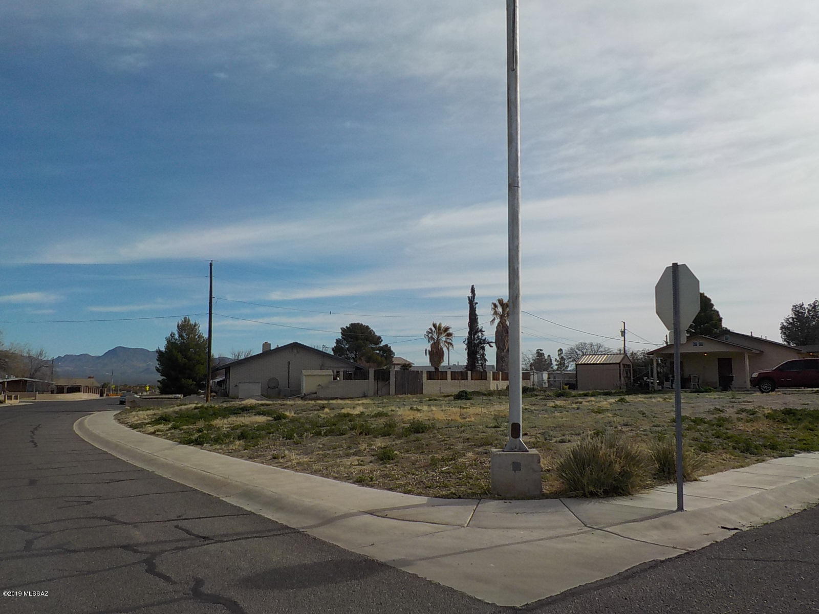 Nice corner lot in an established neighborhood. Great area to build. All utilities are at the lot line. Fantastic mountain views close to parks and golf course.