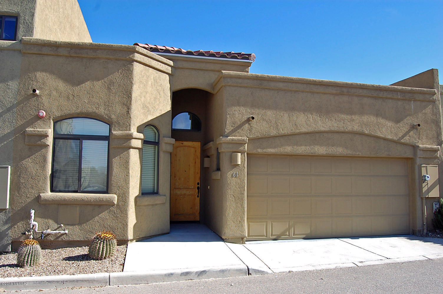 Mountain views are absolutely breathtaking! Private neighborhood off Houghton/ Sahuarita Road. Backs former Santa Rita Golf Course. No homes behind, just open space. Luxury town home features Granite counters, Maple cabinets, Ceramic tile in all living areas, GE appliances and a 2 car garage. Exterior is sand finished stucco with tile roof. Vail Schools, less than 10 min. from I-10. Owners are licensed AZ Real Estate Brokers. Come see! Note: Bedroom pictures show carpet but it has been replaced with tile. No smokers. No smokers.