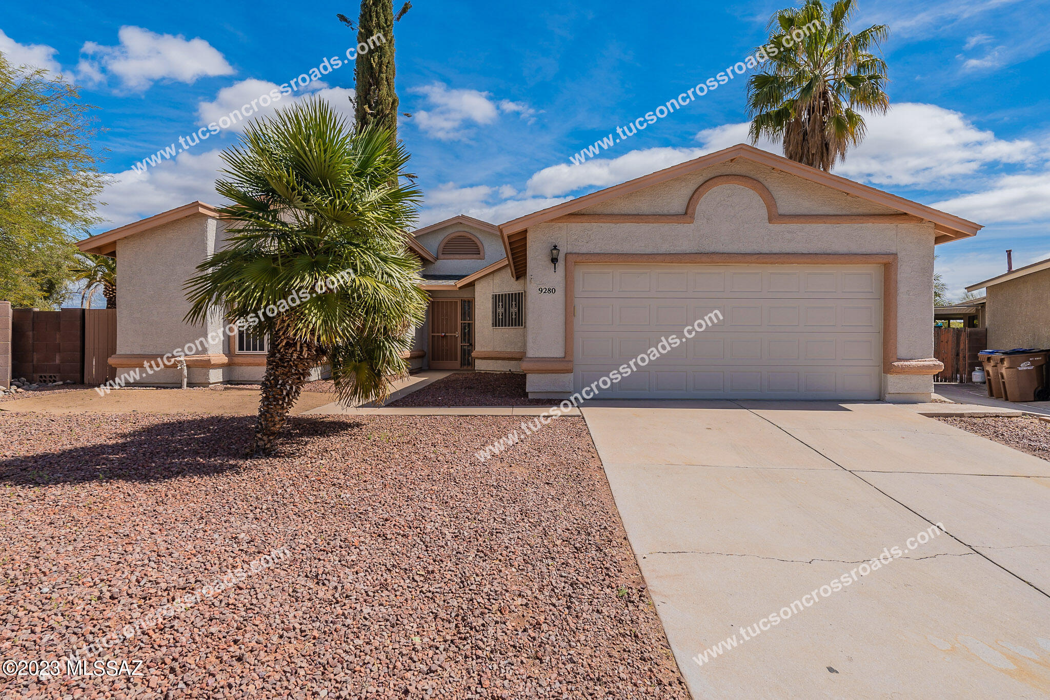 Charming home with sparkling pool located at the end of a cul-de-sac street in quiet small NW subdivision. 3 bed 2 bath home with spacious eat-in kitchen, living room with tall vaulted ceilings, & fully enclosed Arizona room. Tile & wood flooring throughout (no carpet). Primary bedroom features walk-in closet and primary bath features separate shower & bath and double sink vanity. Security door at front entrance. French doors from Arizona room open to covered patio, pool & large backyard. 2 car garage with work bench & laundry area (washer & dryer included). Weekly pool service provided. Non-smoking home. 1 year minimum lease. Subject to credit approval & application process. $45 application fee per adult. Renters insurance required.