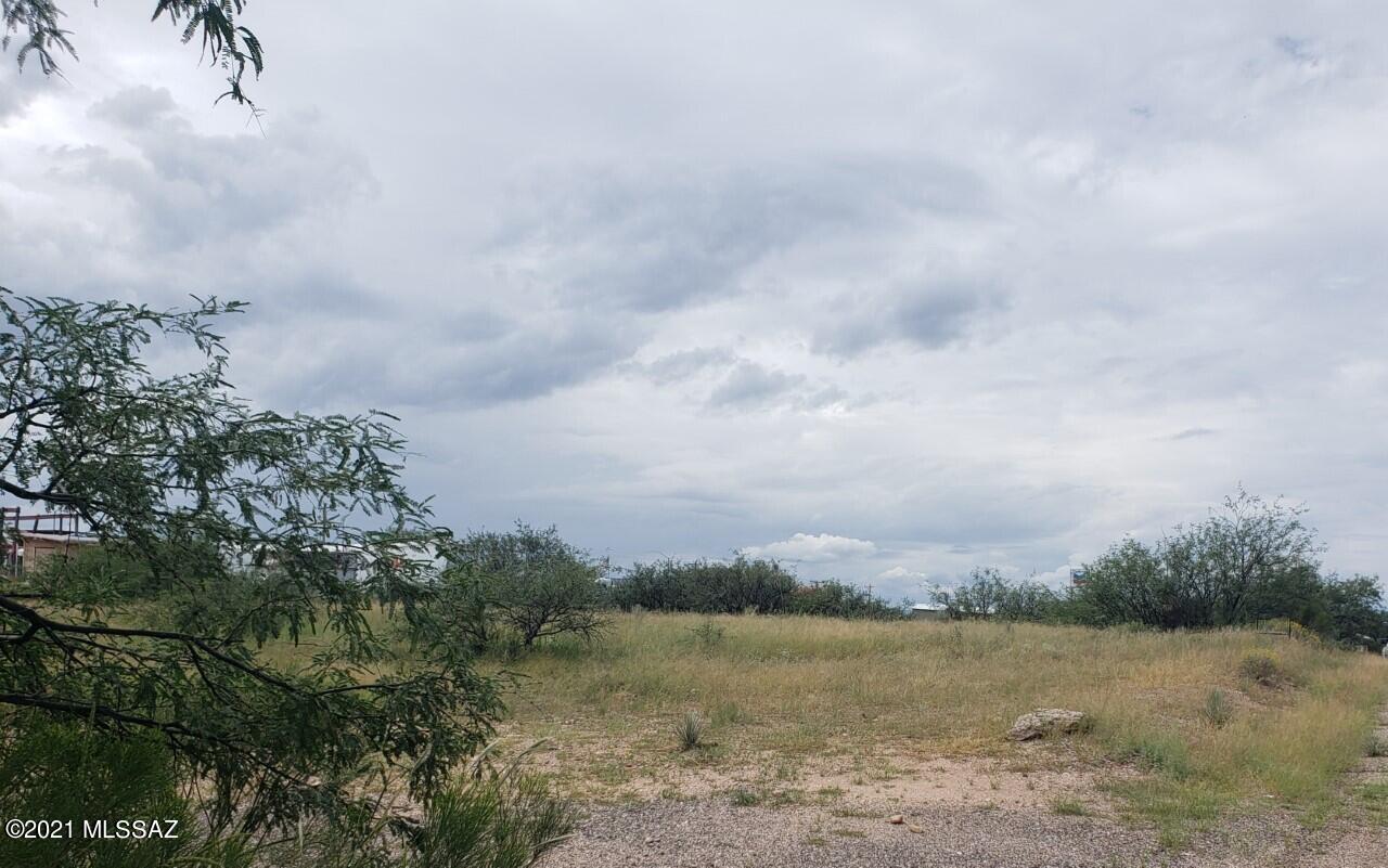 Great buildable lot nearby to shopping and  utilities. Easy I-10 access 25 minutes to Tucson.  Property backs up to Frontage Rd businesses, separated by alley/ easement.