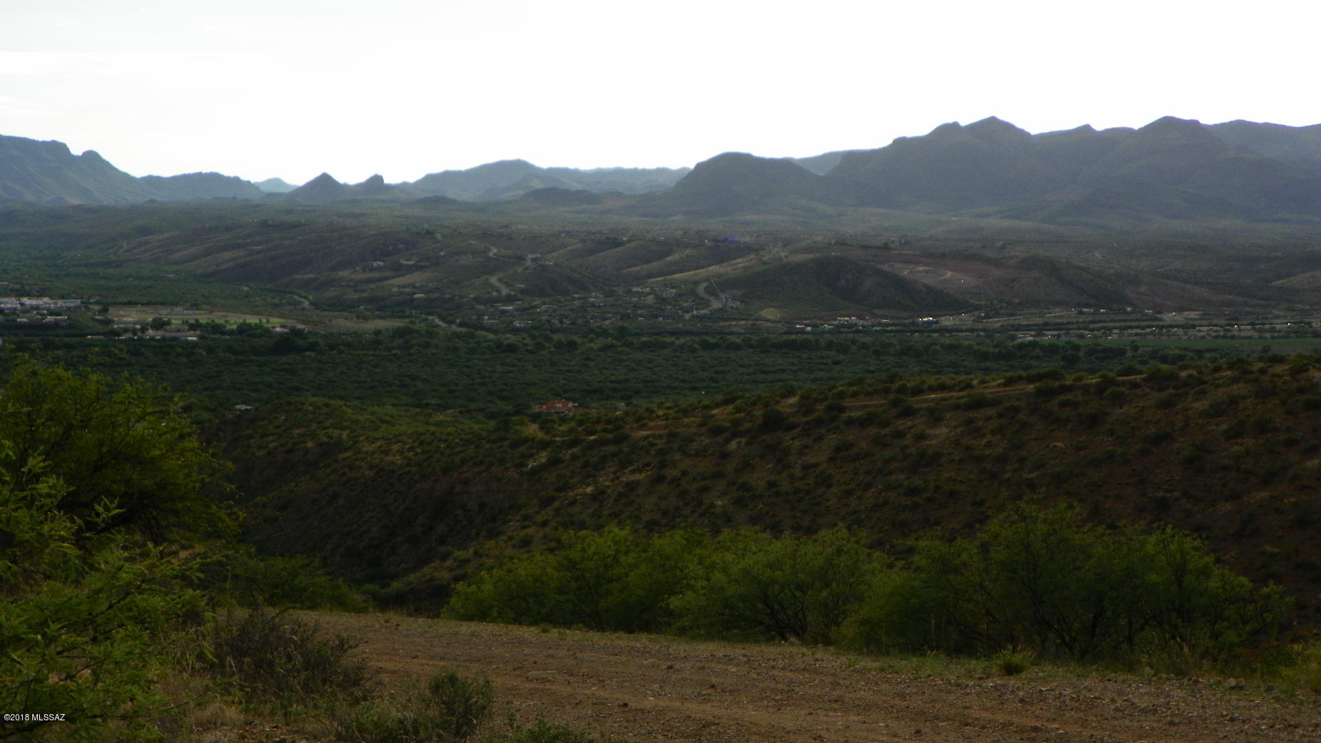 Very nice lot with awesome mountain and valley views.  Enjoy the beautiful sunrises and sunsets.  Electric and water at the street (water should always be verified during inspection period).  Great lot for that custom home!