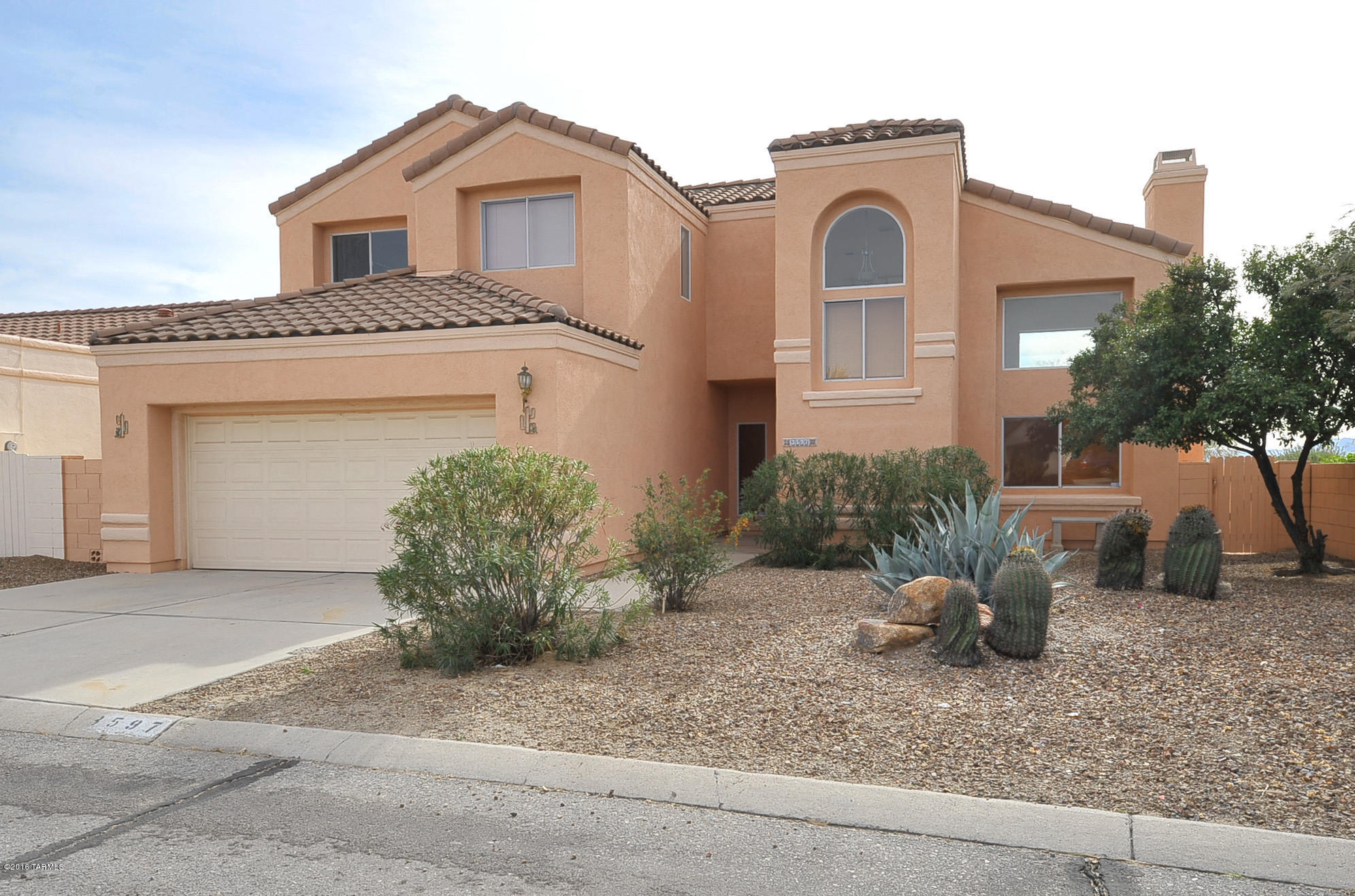 North Ranch community, ALL TILE.  Fresh paint, 3 bedrooms, 3 baths, large living area with gas Fireplace back slider door to access rear yard, separate family room doors to outside, bath downstairs, laundry room with gas hook up dryer, 2 car garage, upstairs master suite with double sinks, separate tub, shower, mirrored closet doors, 2 other bedrooms and double sinks in hall bath.  Community pool, spa, tennis, basket ball, rec center and park close by. Ask  about P# 3110-Q