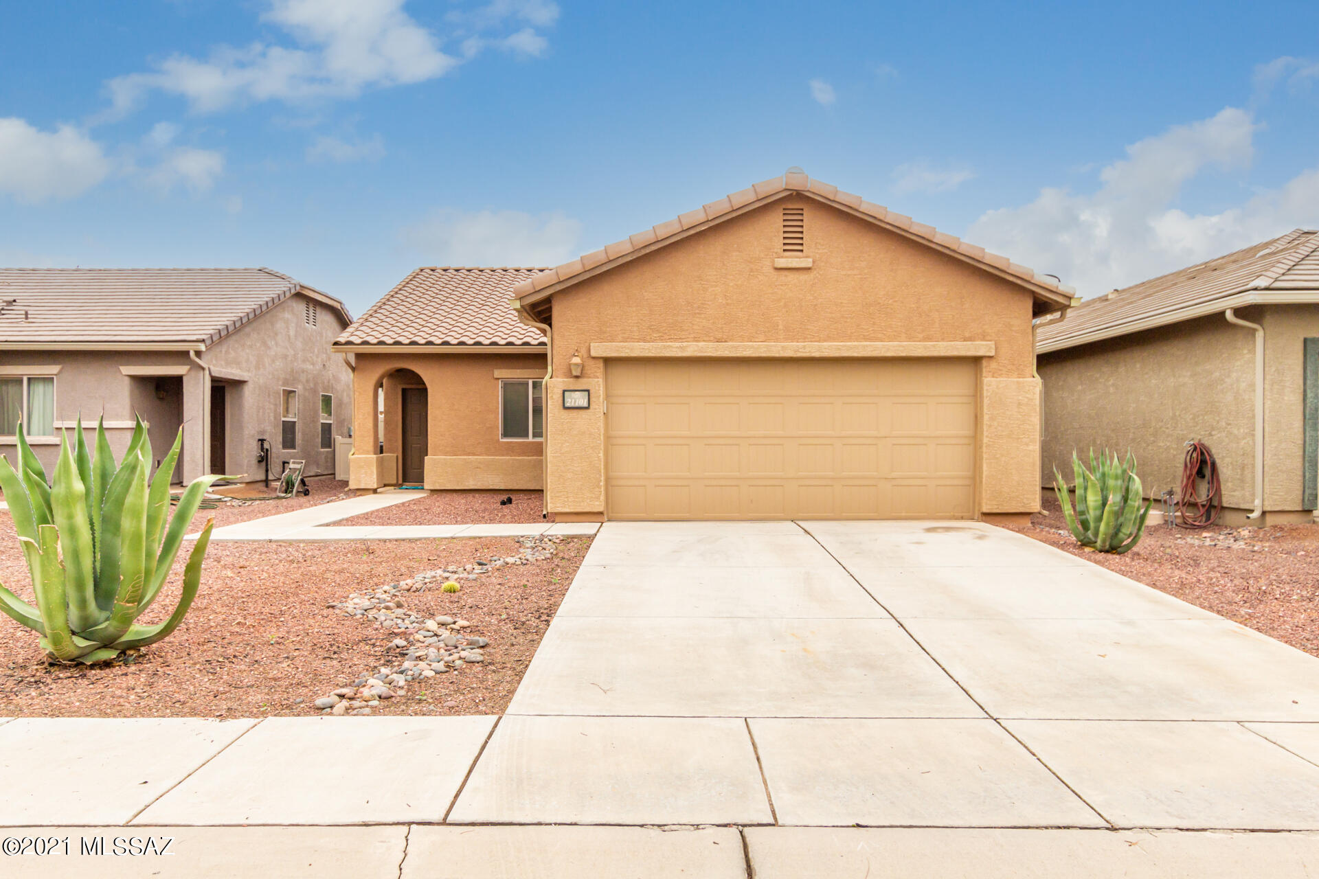 Seller will accept or counter offers between $195,000 - $205,000.  Adorable home in the fabulous Red Rock community with lots of amenities! This home features tile flooring throughout the main living areas with carpet in the bedrooms.  Community pool, parks, basketball courts and more!  Hop onto I-10 in just minutes to Tucson or Phoenix.  If you are looking for a quick move-and low maintenance home in a great community at great price, this is the home for you! Come see it soon because this one won't last long!