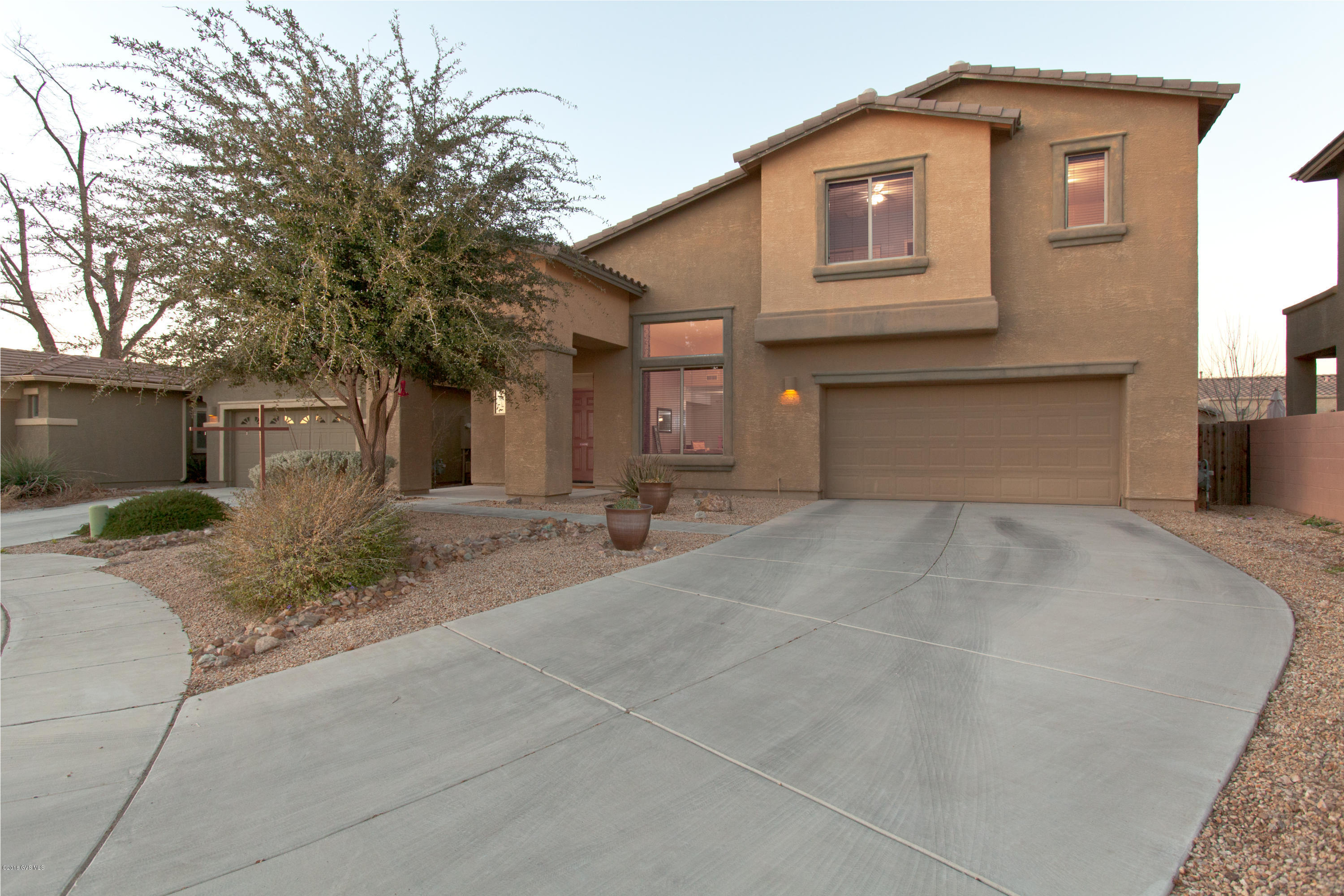 Perfect family home, at end of col-de-sac. Oversized tandem garage fits 3 cars plus more and features a man door. Kids to enter home through garage and laundry. Walking distance of 14 acre park & community pool. Private floor plan allows for kids to have fun yet parents to have peace. Master suite separated by den and two bathrooms. Den functions as a flexible 4th bedroom with private office on main floor. Home run to office allows you to hide entertainment equipment out of sight for TV in great room. Separate living room features space for formal dining. Too much to list here. Watch tour video in and call your agent to view this AMAZING home before it's too late.