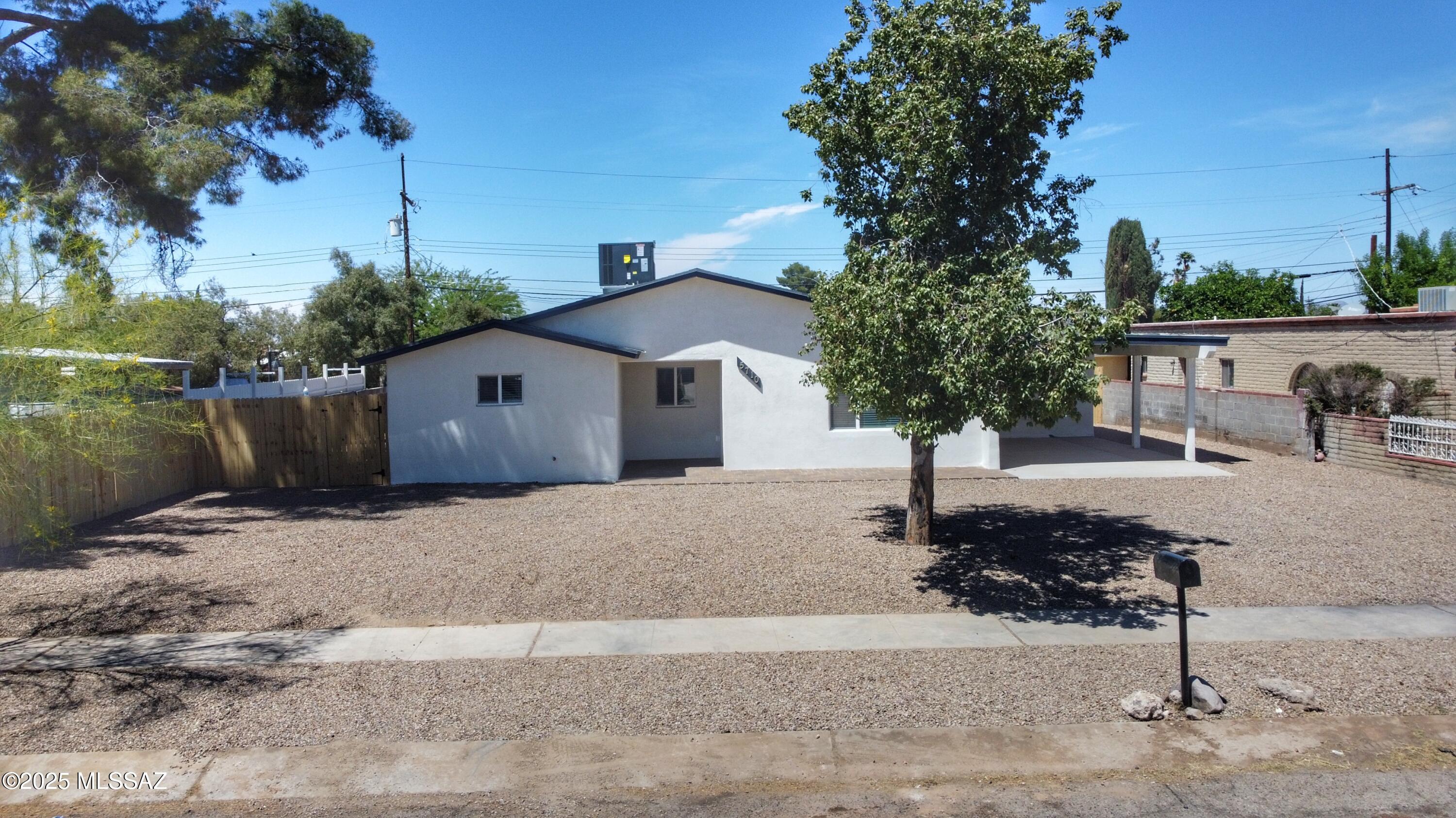 Completely rebuilt in 2024-2025 new home! Features 2 spacious master suites, a chef's kitchen with  blue cabinets, white quartz counters, and brand-new stainless steel appliances. Ceramic tile flows throughout. Spa-like bathrooms with designer tile, weathered oak vanities, and quartz tops. Large fenced yard in a great neighborhood—close to everything.  Move-in ready with high-end finishes throughout!