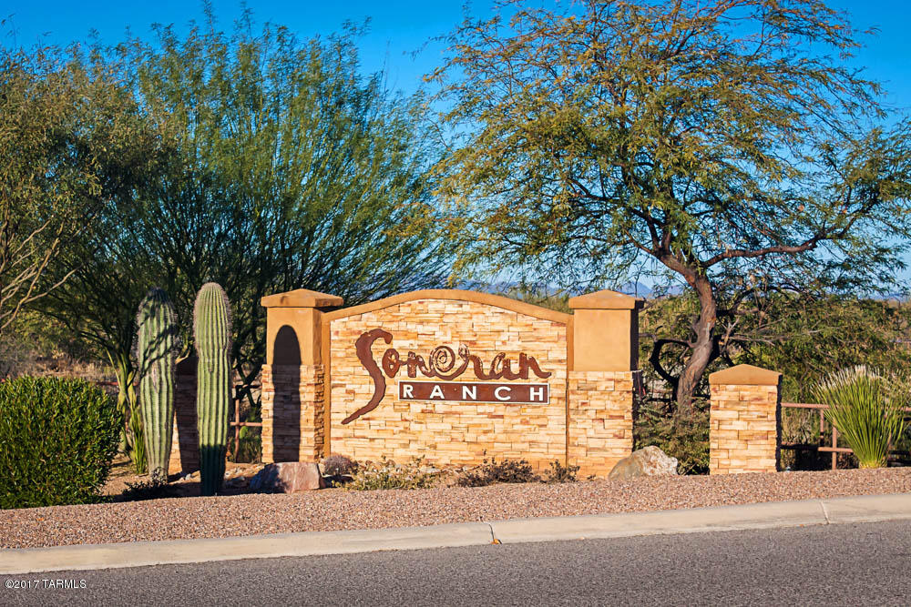 This beautiful new home comes with over $10,000 in upgrades including energy efficient kitchen appliances, spacious granite countertops, custom wood cabinets, brushed nickel hardware and an attached two car garage. The Bisbee floor plan also showcases a master suite complete with a walk-in closet, as well as a separate dining room, a fully fenced backyard, covered patio and front yard landscaping. The Sonoran Ranch community offers a plethora of amenities including miles of walking trails, as well as a park with a children’s playground and a spacious picnic area. The amenity-rich community and new, hassle-free home provide an extraordinary lifestyle for you and your family.