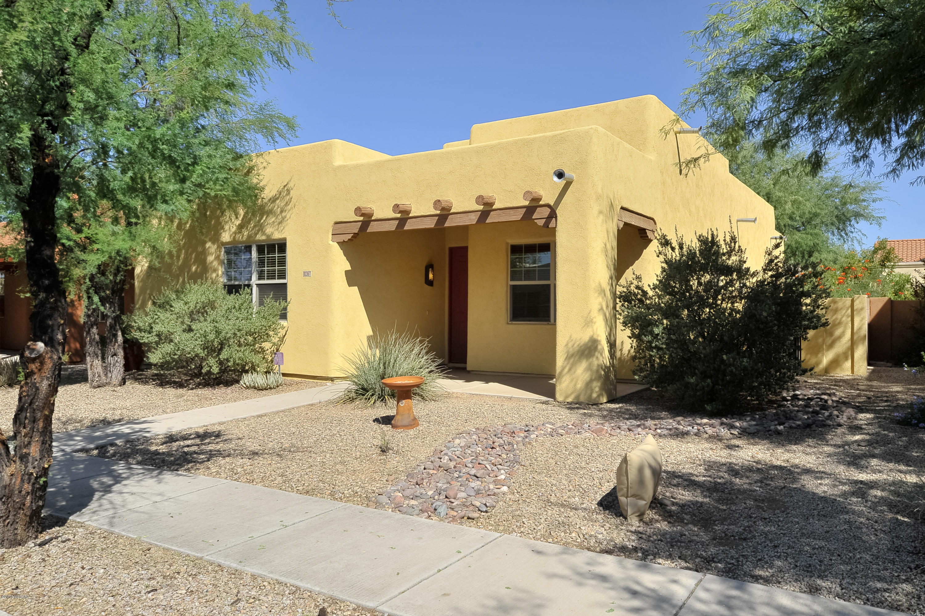 Civano!!  This great home has high planked board ceilings, 3 bedrooms 2 baths, washer/dryer, refrigerator included, ceiling fans, 2 car garage.  Private rear yard and front porch for enjoying the neighborhood.  Community includes beautiful shady tree lined streets, activity center, community garden, 2 pools, paths, parks, garden center and more!! Ask about P#3086-Q