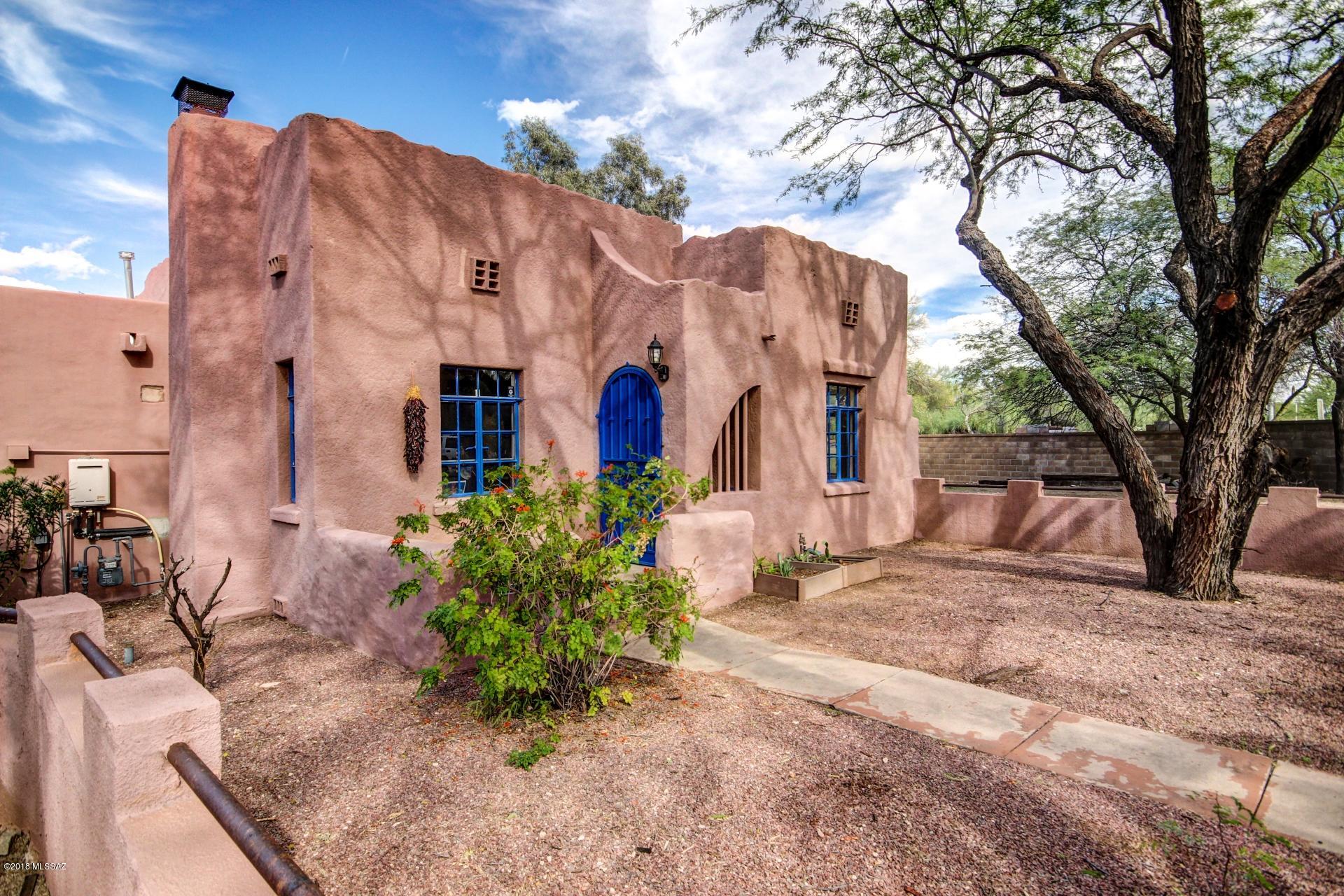 Don't Miss This 1929 Vintage UofA Home + Casita On The Corner Of Campbell & 10th.  2 Bdrm Main Home & 1 Bdrm Casita feature Wood Floors. Natural Lighting, Fireplace, Living & Dining Area & Large Laundry.  Kitchen Features Upgraded Solid Surface Counter Tops, Cabinetry, Viking Refrigerator, Gas Range, Built-in Microwave, Skylight, New Disposal, Tank-less Water Heater, Copper Plumbing, New Sewer Lines to Street. A Spacious Casita With 3/4 Bath, Kitchenette, AC and Storage. Walled Rear Yard Is Complete With A 1 Car Garage & Storage Shed. Courtyards & Open Space Make This Home Great for Entertaining. Home Is Four Blocks From The UofA, UMC Hospital And Has Convenient Access To I-10 & Aviation Hwy.  Home Qualifies for the Historic Tax Rate and is Alarmed. Great Location & Plenty of Character!
