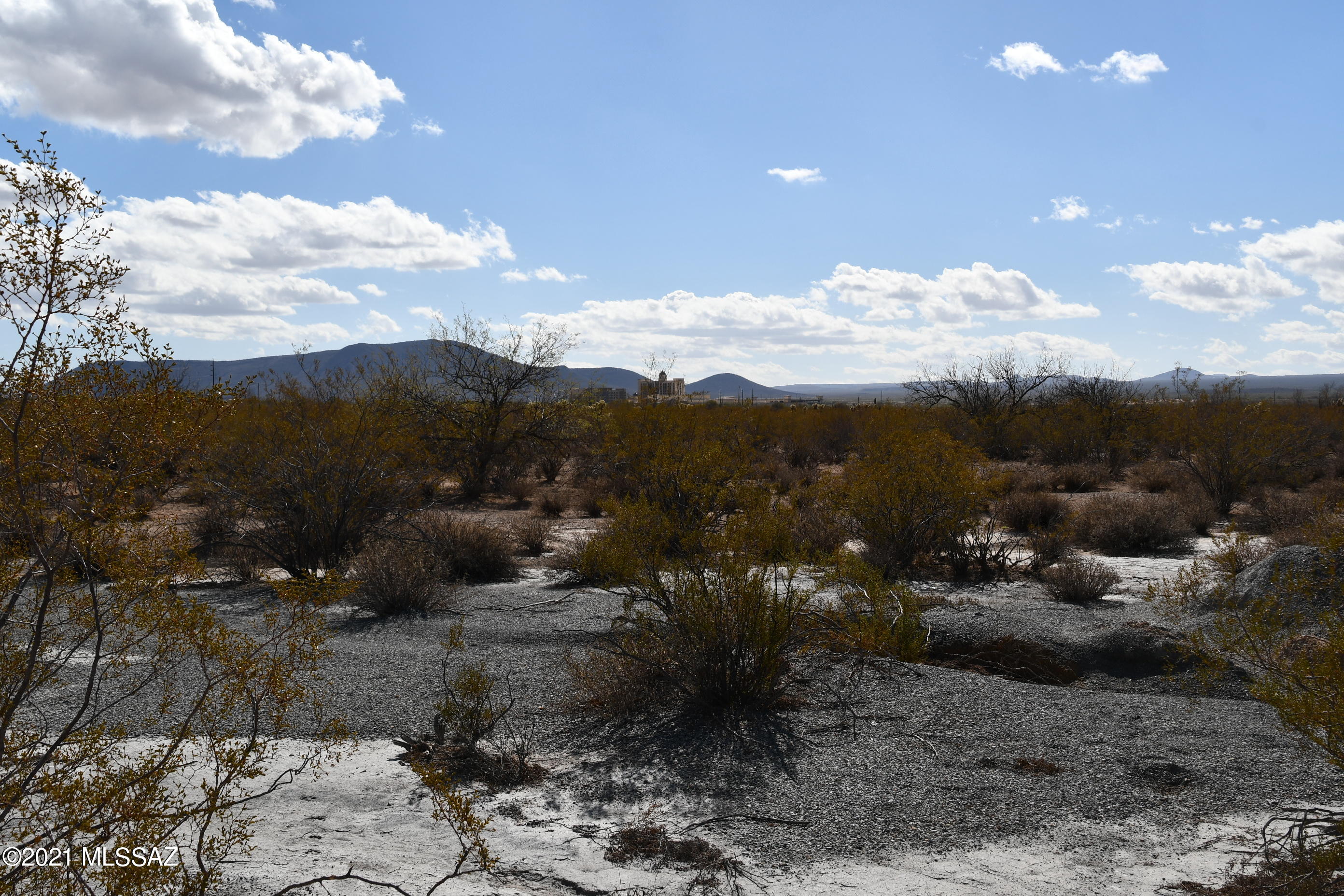 A very rare find and terrific opportunity! First time offered, perfect for mini-ranch with country feeling only a few miles to downtown, shopping and casino. Area of custom homes however manufactured homes allowed per sensible deed restrictions. No HOA, easy build land, panoramic views, horses allowed. Property served by shared water well and TRICO electric. Dividable GR1 zoned property. Additional parcels available up to 32+- acres. Seller finance possible.