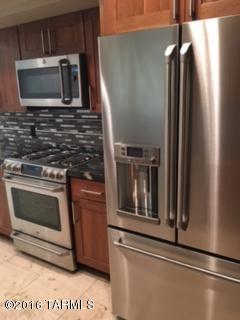 Remodeled beautiful townhome on corner lot in community with community pool and spa.  Stainless appliances, granite in kitchen and both bathrooms, everything new and remodeled.  Washer and dryer included