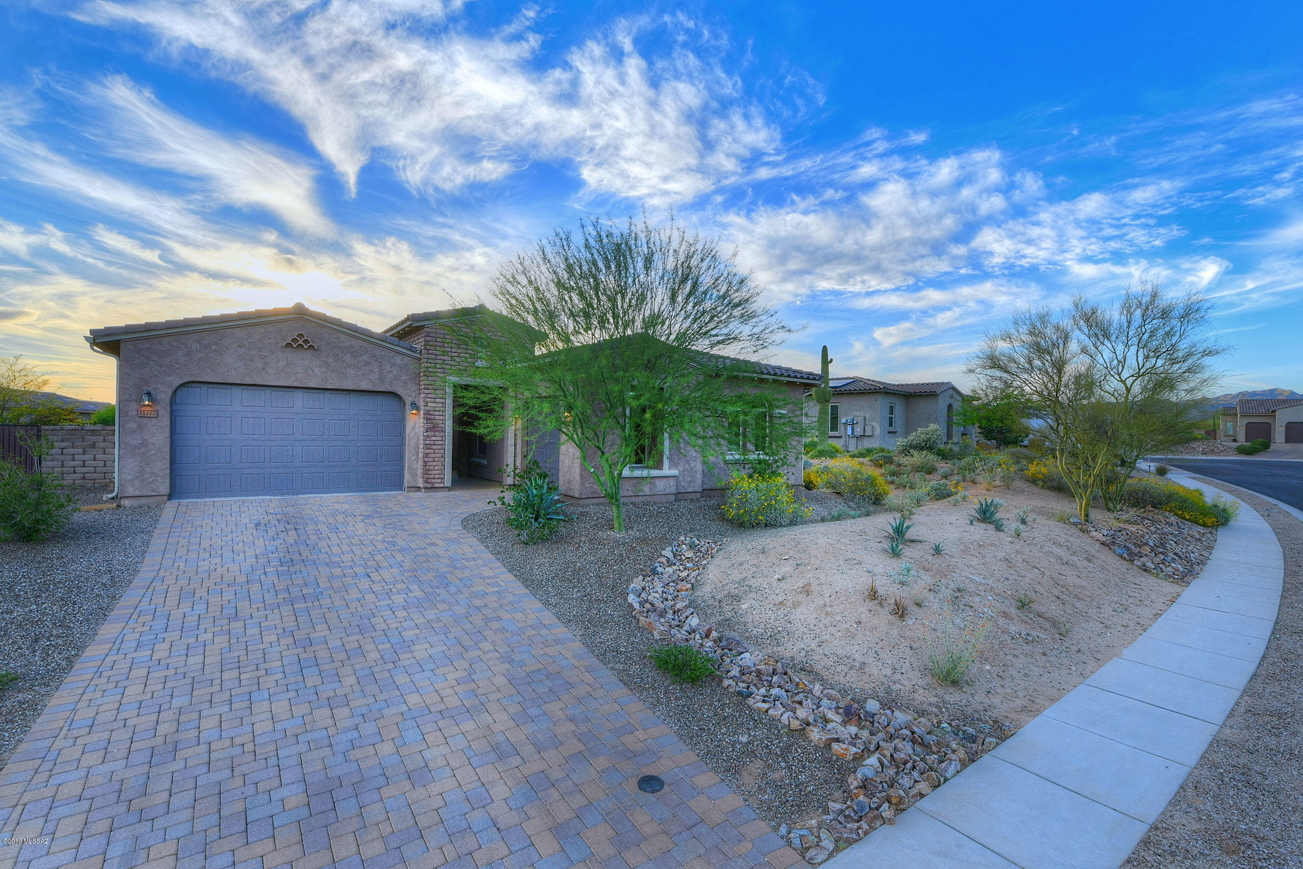 Seller shall entertain and/or counter offers between $475,000 & $500,000.This immaculate home in gated Rancho Del Cobre has it all! Gorgeous open living spaces with lots of windows for great natural light, flexible split bedroom floorplan, 2+1 car garage, and more! Open, stylish kitchen with island, granite counters, 5 burner gas range, double wall ovens, ample workspace and storage. Owner's suite is private and offers large bath with separate walk-in shower, split double vanity, and large walk-in closet. 3 guest bedrooms serviced by full guest bath and additional half bath, as well as a spacious laundry/mudroom with plenty of storage and counter space, round out this outstanding home! Great outdoor space with large covered patio and expansive brick paver seating area, water feature, and lovely garden area/planting beds. Charming neighborhood park is nearby!