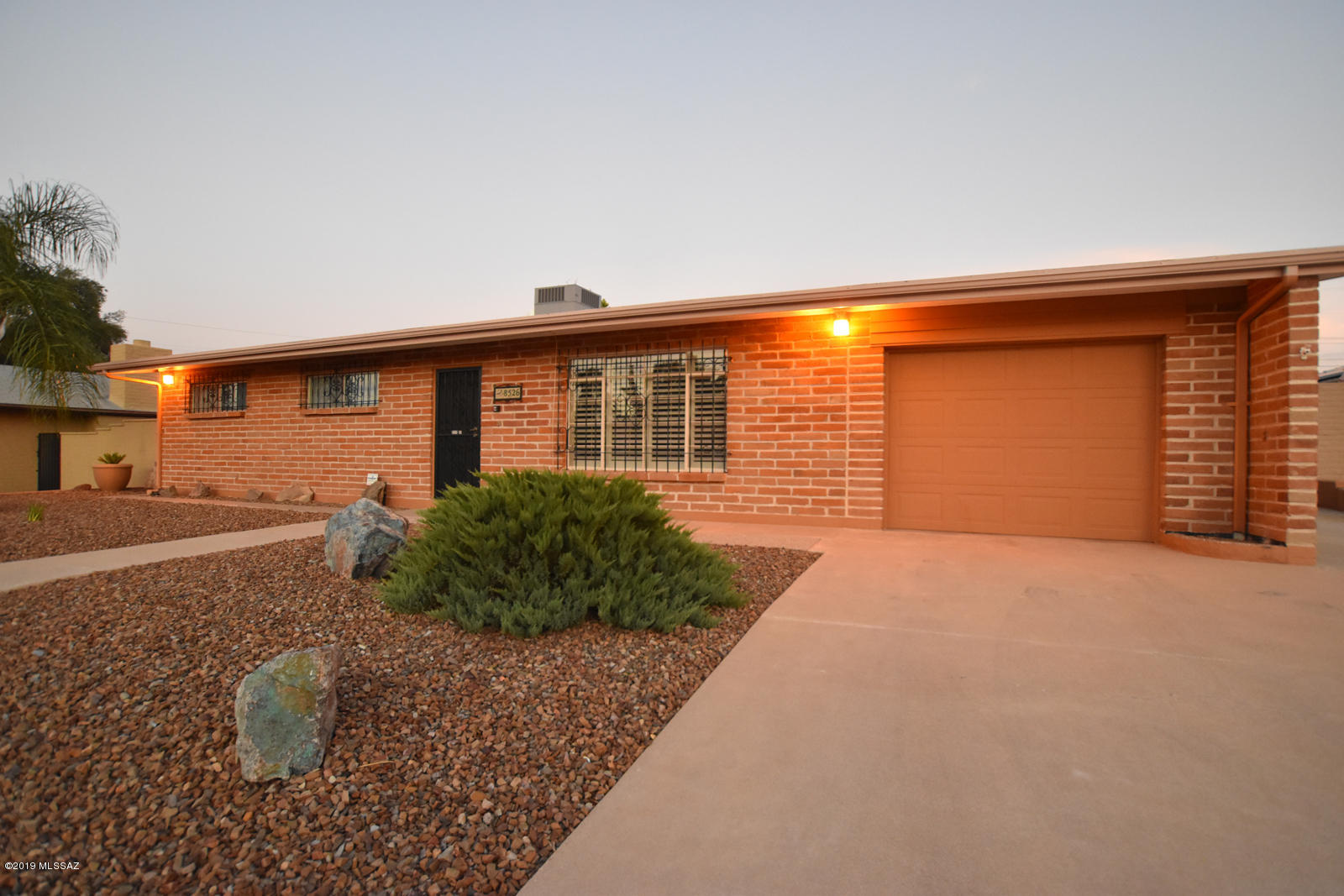 New Price Reduction! Range marketing $215,000-225,000. Now listed for less than $100 a sq ft! Family gatherings? Need space to roam? Need storage space!!This house is for you! East side home 3 bed/2bath, two  AC units, all appliances stay, large great room and large kitchen with breakfast bar, skylights, major storage rooms that can be workshops/offices/storage space. Huge back yard!!!On a cul-de-sac! Parking for RV is available as is a one car garage with lots of storage. Close to shopping/restaurants/bowling alley!
