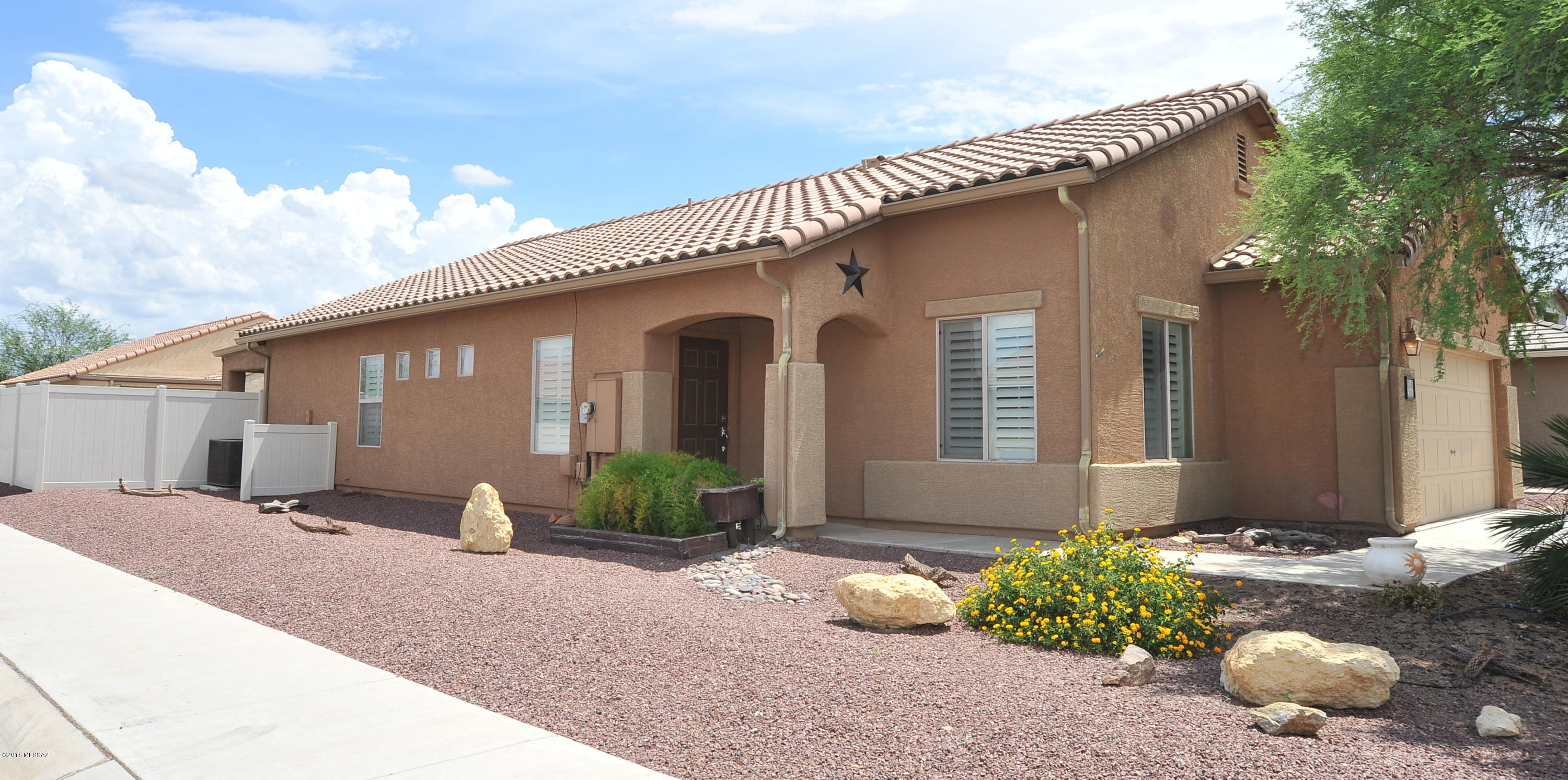 Seller will consider offers w/in the range: 175k to 180k. BETTER THAN NEW! This well-cared for home feels new! It has 4 bedrooms/2 baths & a SWEET STAINLESS AND GRANITE KITCHEN w/ gorgeous cherry cabinets (TONS of storage) & a breakfast nook (being used as office). This OPEN GREAT ROOM floor plan includes a dining area & large open living room. Master bedroom is large w/ upgraded master bath, dual vanity & his|hers closets! 3 more good sized bedrooms & a large hall bath round out this spacious floor plan. This contemporary w/ title roof, on a nice corner lot, boasts designer paint inside, is CLEAN as a whistle, has a 2 car garage, & the backyard awaits your personal touches. Nothing to do here but bring your suitcases: 100% move in ready. See it today! This beautiful home is priced to sell