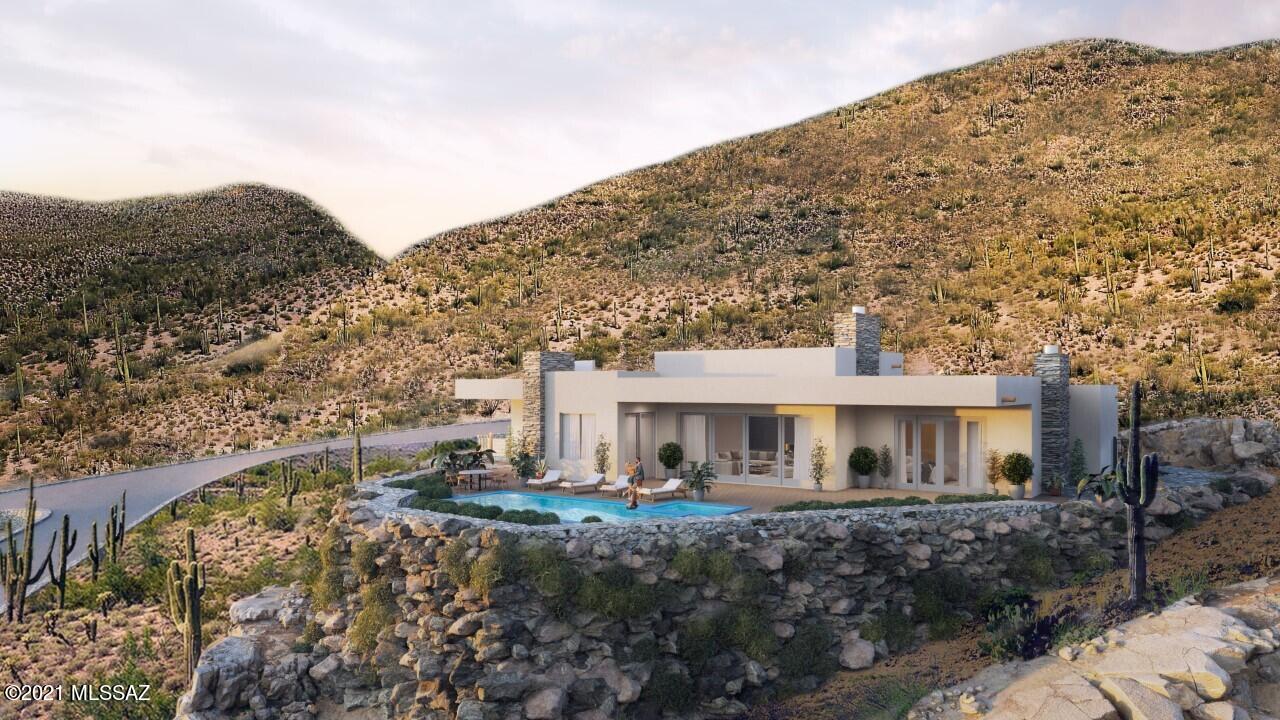 Stunning southwest contemporary home currently under construction by Maccarone Homes in Canyon Pass at Dove Mountain. Scheduled for
completion in August of 2021. Thoughtfully situated on 1.4 acres, all one level - NO steps! Floor plan features 4 bedrooms, 4.5 bathrooms, totally open floor plan, custom bar, bi-parting  glass doors for the best of indoor/outdoor living  & SubZero/Wolf appliances. The building design features fully cantilevered rear decks with NO columns to block your BEST IN THE CANYON sunset and city views - complete with sparkling pool, spa, fire pit & BBQ -  you'll feel like you're living on the bow of a luxury cruise ship! Also including a huge 6-CAR garage!  This one-of-a kind lot is surrounded with complete privacy!  Call for showing, by appointment only.