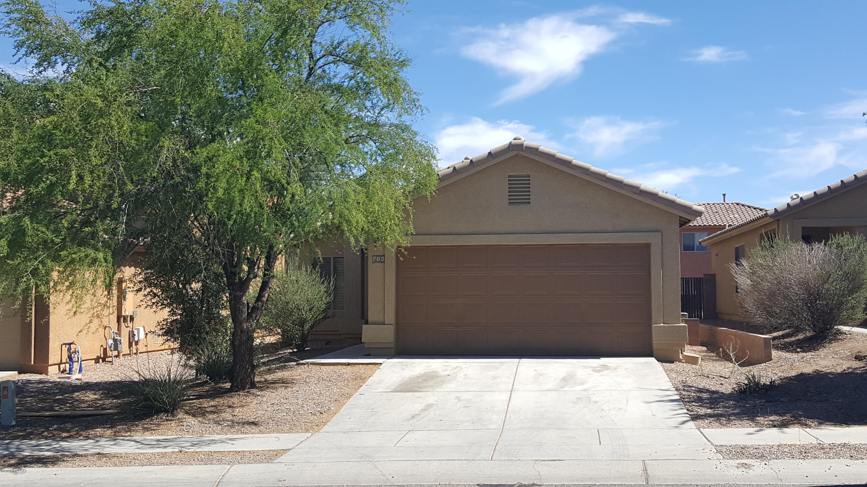 An updated cozy, 3 bedroom, 2 bath free standing home. Recently painted inside and outside with all new flooring and a 2 car garage.