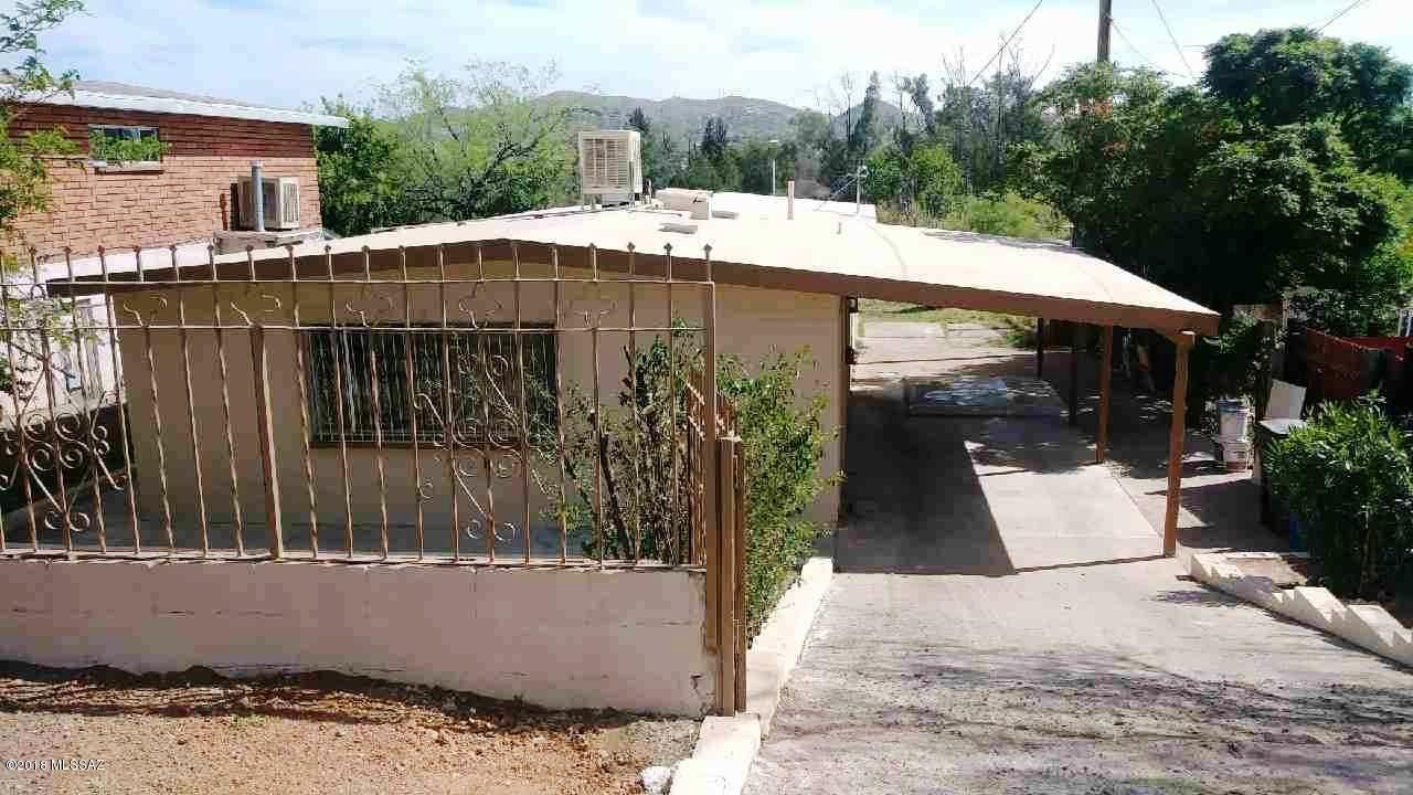 Here's the fully renovated home you've been looking for close to several schools and shopping areas. Cute house offers nice vaulted ceiling in living room area open to the dining area. New roof, upgraded electrical panel, sheet rock and texture, beautiful kitchen, laminate flooring in bedrooms, fixtures, paint, etc. HUGE 500sft bonus room in the back can be used as a workshop, mechanic shop, addition of a studio apartment--Options are endless! Plenty of space in the back to park additional cars or add to the house. Seller holds and active real estate license in the state of Arizona. Owner-agent.