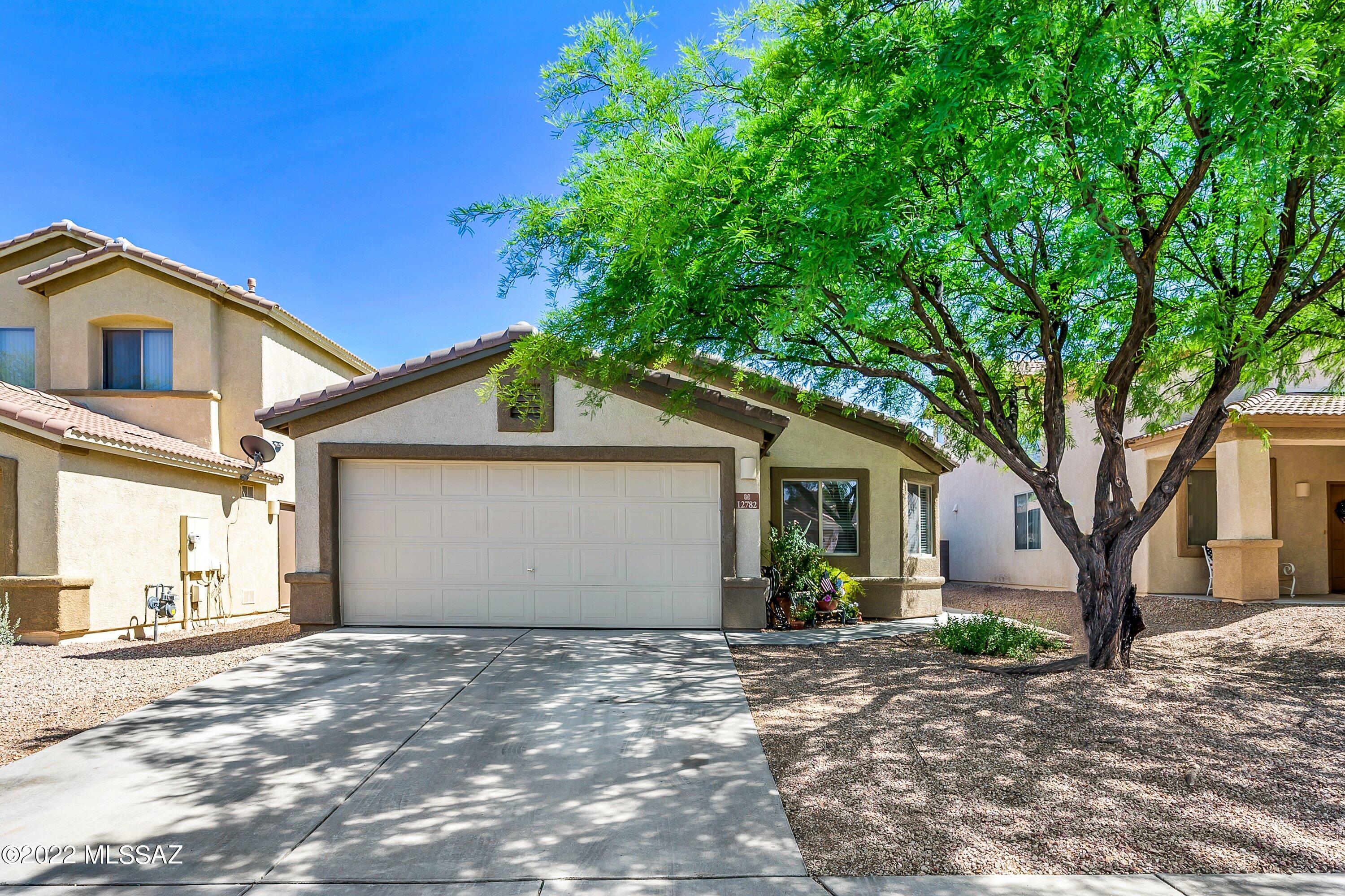 Enjoy this newly updated Richmond American home, located in the heart of Vail. The open floor plan features a great big room that flows into the fully remodeled kitchen with stainless appliances, a split bedroom layout featuring two guest bedrooms, a spacious primary, and a bonus room. Maybe an office or den? Your laundry room (gas dryer hook up) located just off the two-car garage has cabinets and added storage for convenience. The backyard is low care with artificial turf, decorative gravel, and pavers, all to enjoy off your covered patio. Make your personal touches on this gem!