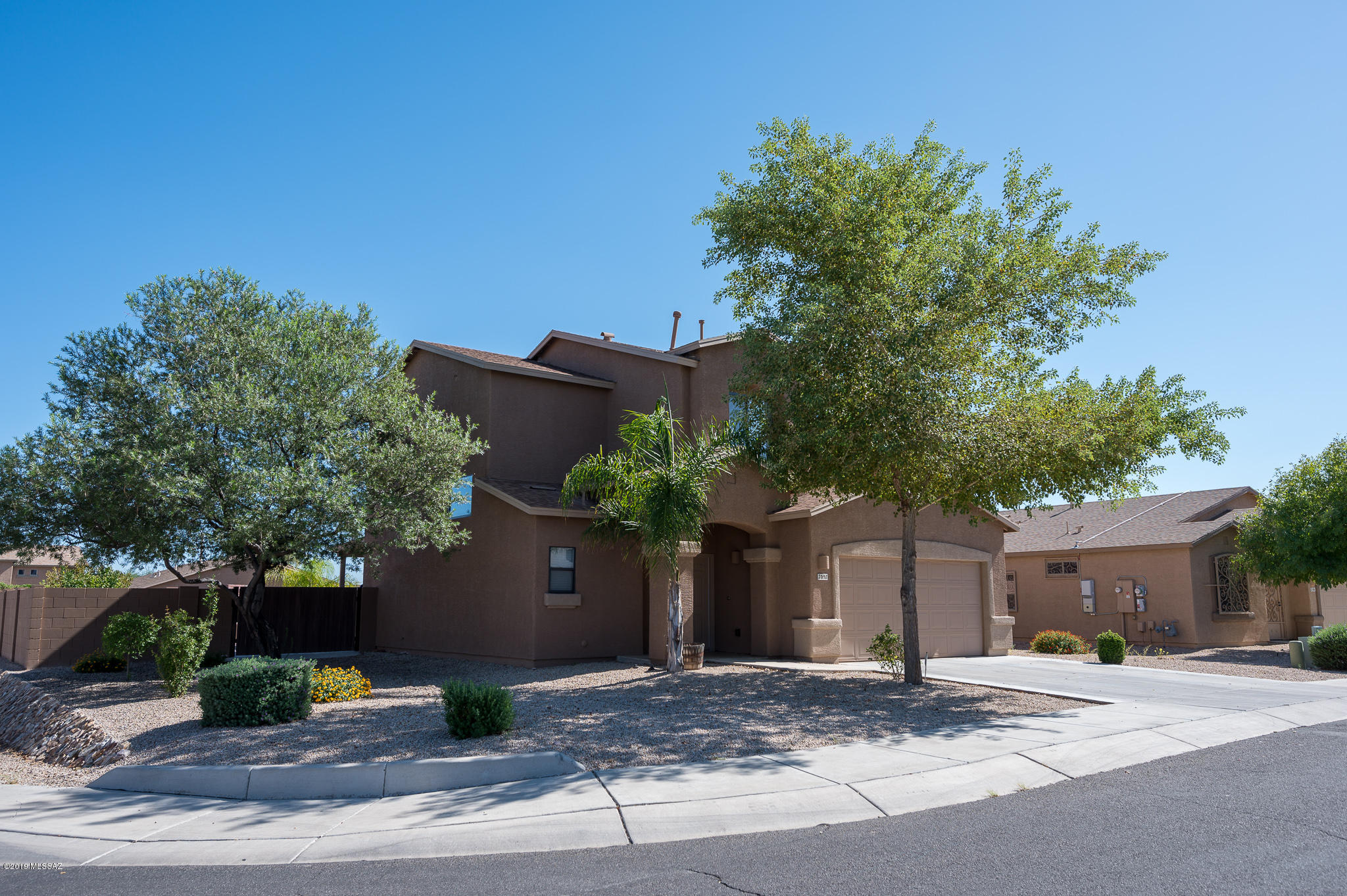 This gorgeous two story home has been remodeled with top quality products and is move in ready. Upon entering the house you notice the professional tile installation and very precise paint job. The living room is spacious with an open kitchen. Heading upstairs you can see the custom railing and upgraded light fixtures. All the rooms are a great size and have memory foam pads underneath the carpets. The exterior of the home has been completely repainted along with seal fascia boards. The BBQ area has a new stainless steal grill, new mini refrigerator, and travertine counter tops. The large back yard is very low maintenance and completely walled for your privacy.