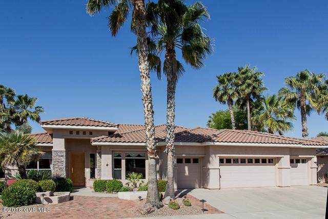 An Incredible Value in Quail Creek for this beautiful executive home located on the golf course on 2 lots! Interior features include travertine floors, 42'' hickory cabinets, Corian counters, huge master suite with separate vanities, soaking tub, glass block snail shower. Custom window treatments & Duette shades are just a few of the many upgrades in this unique home. Guest ''Suite'' has additional 174 sq ft of living space & private patio access giving your guests total privacy. The 3.5 Extended Garage has his/her built-in work & hobby benches. This home is ''simply stunning'' & a must see at this price! Close to all the amenities that Quail Creek has to offer - Madera Club House, The Grill restaurant, Arts & Tech Building, Fitness Center, Pool, Tennis & Pickle-ball!