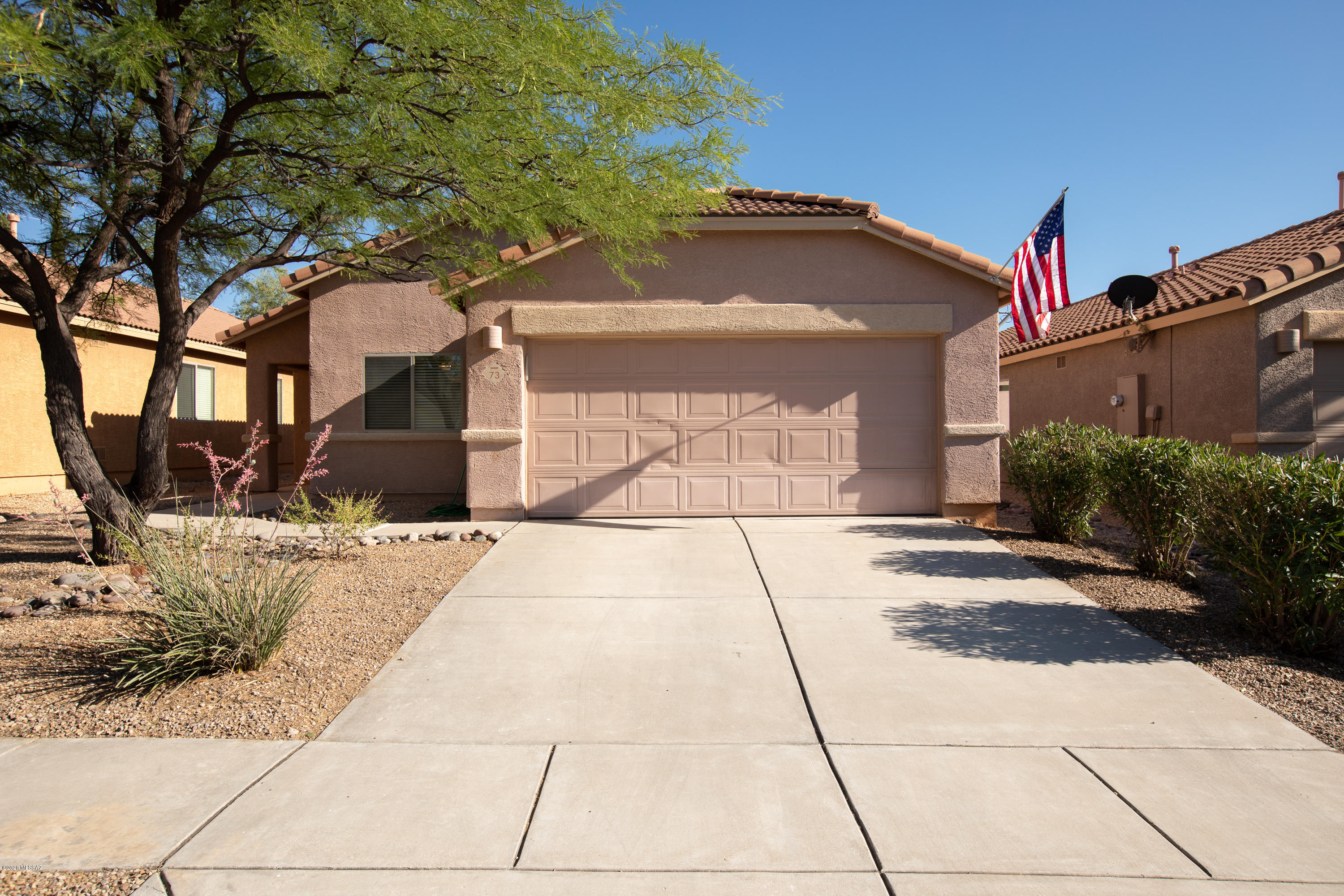 This 4 bedroom 2 bath home is located in a quiet cult-de-sac. At 1,642 square feet, it features a split floor plan with a spacious master bedroom and walk-in closet. It has a beautiful open kitchen with a large dining room/family room. The front and back yards feature freshly trimmed landscaping with large mesquite trees. Watch the summer monsoons roll-in over the Santa Rita Mountains while looking out the back windows. The home is located in the highly desirable Vail School District and it's just a short drive to I-10. Per HOA, the house needs to be painted. Seller is offering an exterior paint allowance, as well as a flooring allowance to cover carpet replacement, if desired. Allowances to be given at closing.