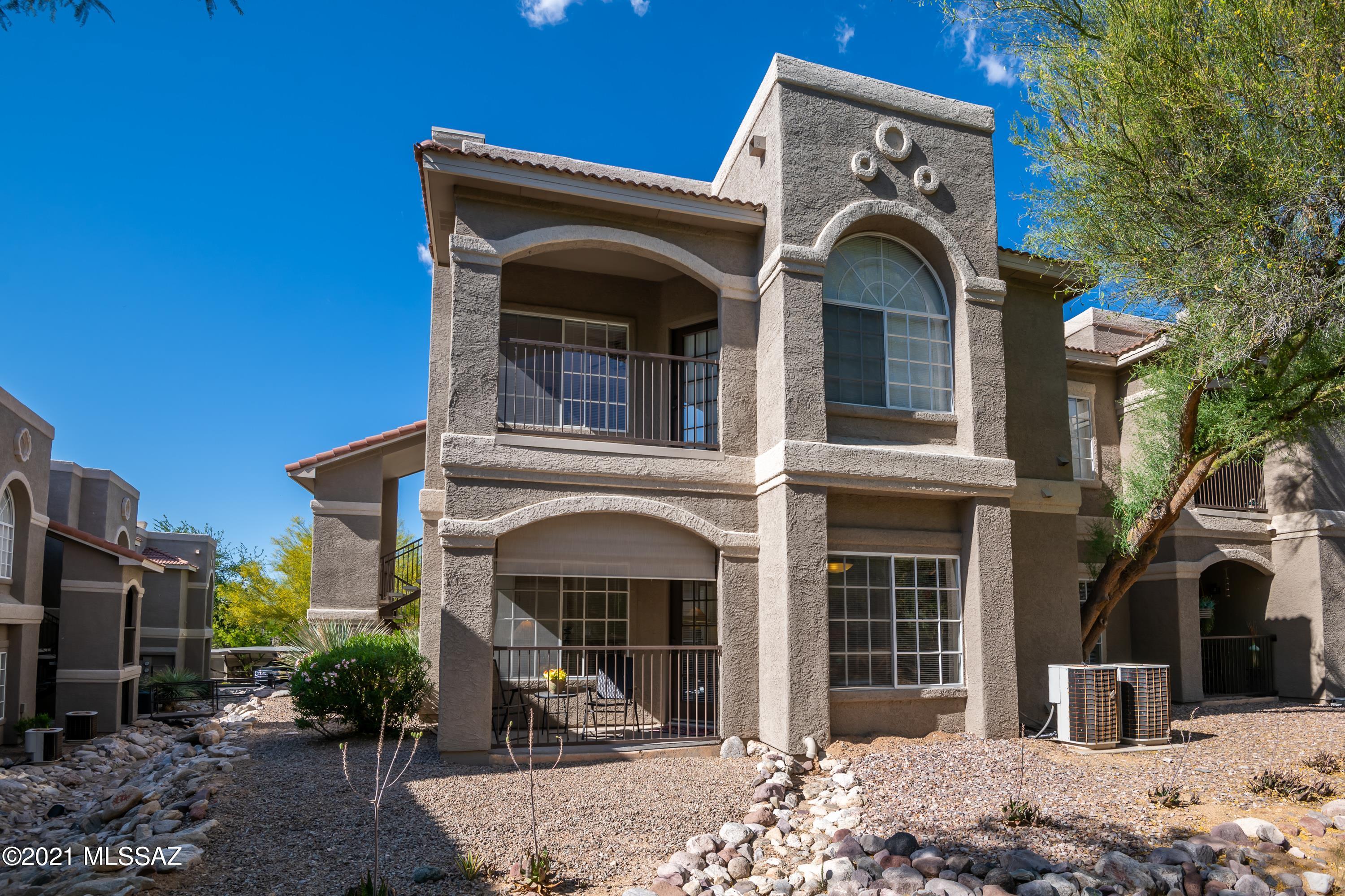 A rare find! Ground floor fully furnished condo located in resort like community The Boulders at La Reserve Condominiums in desirable Oro Valley.  This tucked away home offers privacy for your perfect winter retreat, rental, or your place to call home. Features in this tastefully furnished home include an open kitchen plan with updated granite countertops, stainless appliances, new carpet, recently remodeled walk-in shower in guest bath and covered patio with natural desert view. The spacious MA bedroom and guest bedroom have large walk-in closets. Washer & dryer in unit and assigned, single car covered carport space. HOA includes heated pool and spa, exercise facilities, clubhouse and more. Close to dining, shopping,  Catalina State Park, biking trail, health care.  This will go fast.