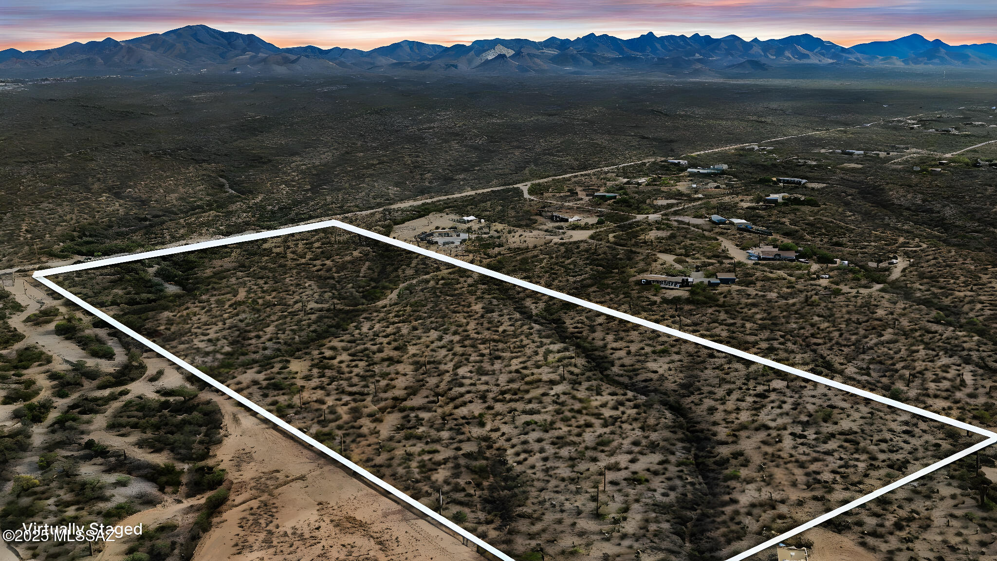 Comps support a Market Value of 500K+! This expansive 20-acre property in Sahuarita, AZ, offers an exceptional opportunity for developers and builders with a private well and electricity. It can be split into four separate parcels, providing great potential for residential or mixed-use development. Located in a quiet, peaceful area, the land boasts breathtaking mountain views and stunning sunsets, creating a tranquil setting for a future community. With its flat, usable terrain, the property combines privacy and seclusion with convenient access to local amenities, shopping, and major roadways. Whether you want to create a new neighborhood or a custom project, this land offers your vision's ideal space and location.