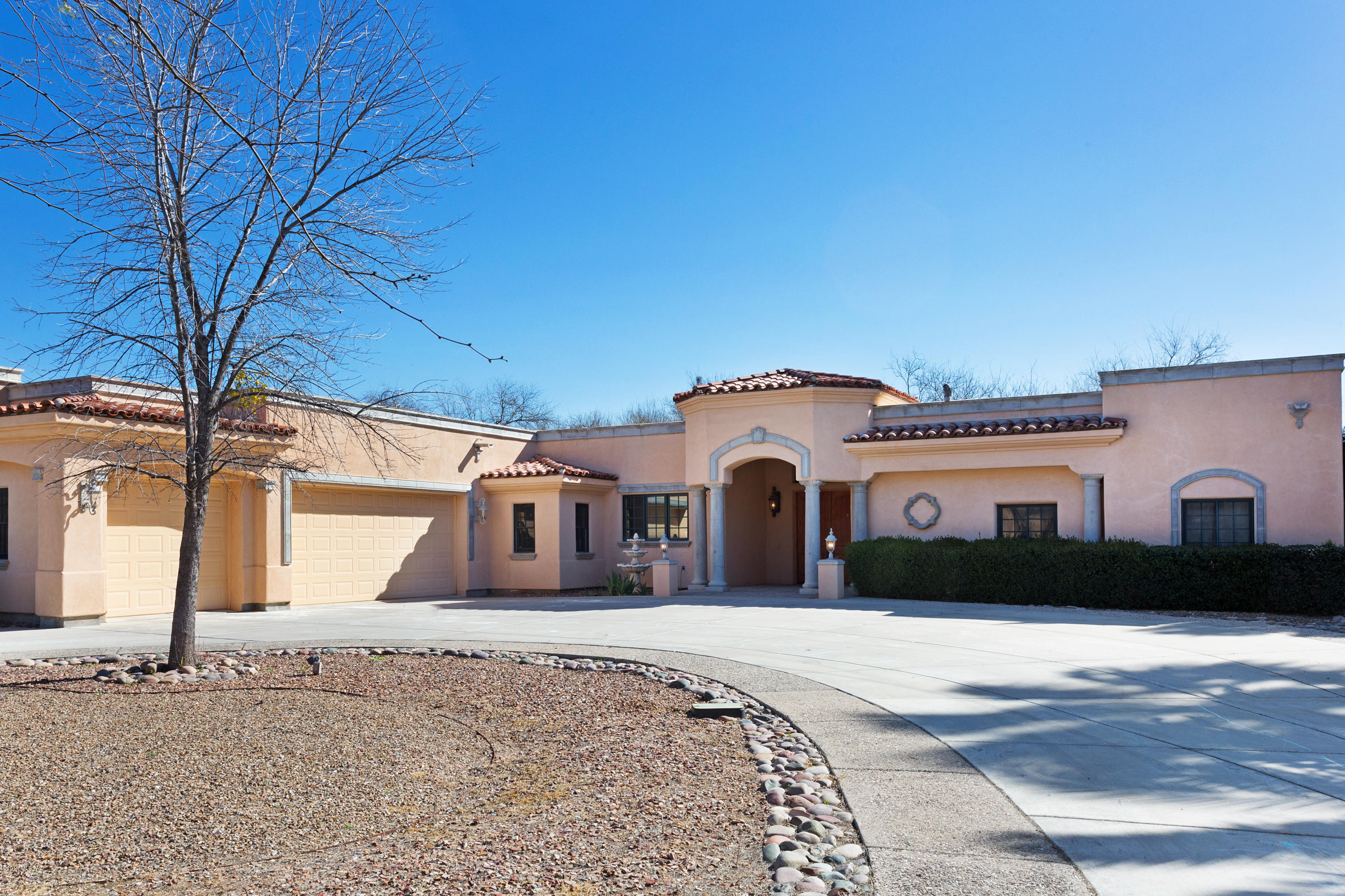 Amazing home in 49ers. CC.  A  beautiful Mediterranean w/warmth and charm. The eat-in kitchen is stunning and opens to a massive great room w/a built-in office area. The kitchen features high-end appliances, custom cabinets, granite, breakfast bar, walk-in pantry & over-sized island w/sink, ice maker & warming drawer. The formal living room has cantera pillars & fireplace. The relaxing master retreat has a fireplace, enormous closet & a huge master bath. The home's quality finishes include pristine cherry wood flooring, travertine, substantial millwork, built-in cabinetry & incredible lighting. Mass amounts of storage & a craft room are added bonuses.  Listing agent related to Seller.
