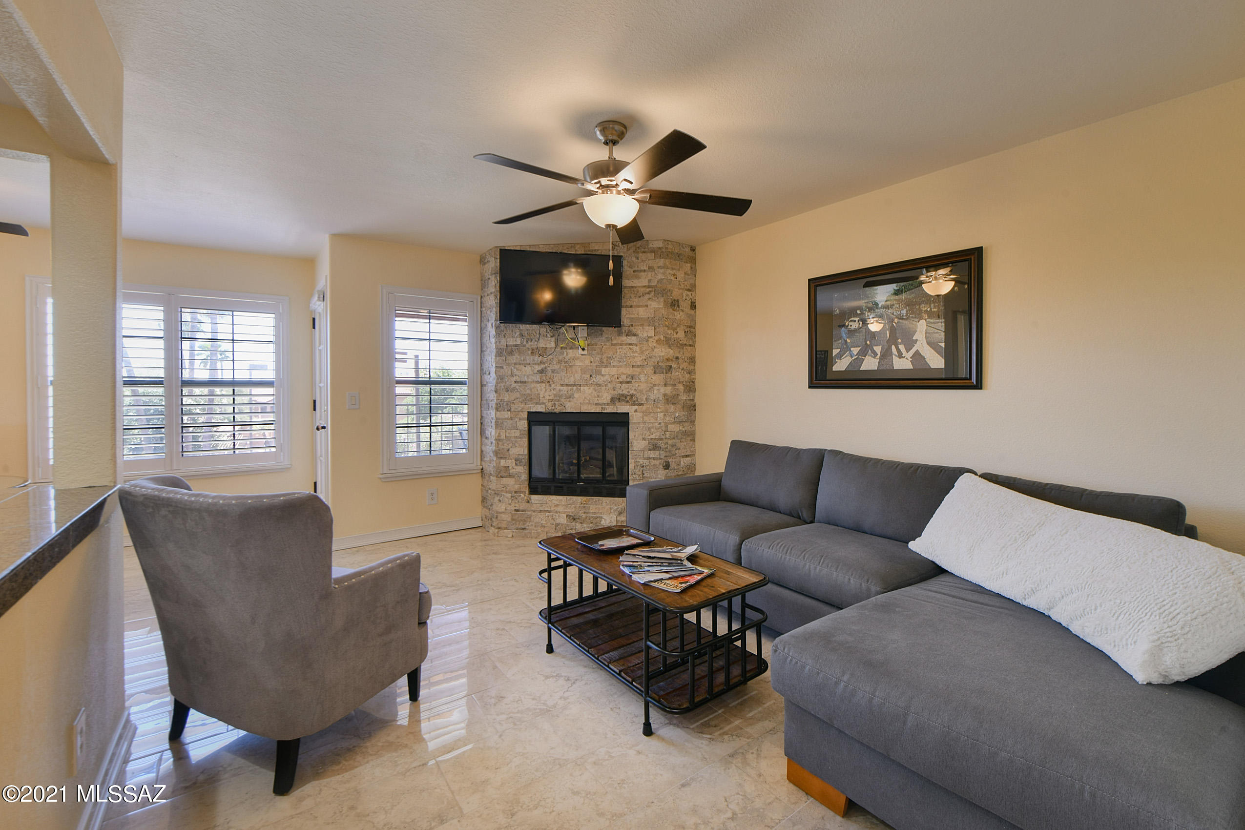 Luxury Resort living in one of the most premium locations the Catalina Foothills has to offer. This unit has been freshly renovated with precision & custom detail throughout.  A few of the finishes include 12 x 24 glamorous tile in all rooms minus the bathrooms which feature Tumbled Travertine. Additional upgrades include custom ceiling fans, Plantation shutters, & Granite counter tops in the kitchen & bathrooms. Both bedrooms feature walk in closets & private bathrooms. The guest bedroom offers a Murphy Bed/desk combo to utilize as an ideal home office.  The large private balcony off the Great room includes a small cat/dog door for the animals to get  fresh air. Walk to La Encantada and all the fashion and cuisine it has to offer! Call for Availability& seasonal rates. Owner/Agent