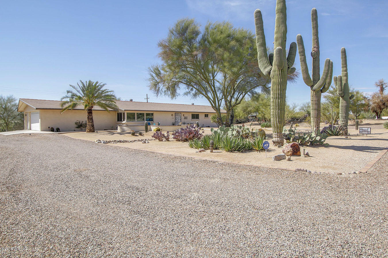 TAR Home Tour Winner! Beautifully updated 1962 Ranch Style Home: 4br/2ba on .94 acre lot with mountain views and no HOA. HVAC replaced Dec 2017, 200 amp electrical panel, custom kitchen & baths, Triple Pane windows/doors, California Closets, Tucson Turf with additional 13+ year warranty, GE Monogram Stainless Steel appliances, 2 car garage with workbench & storage. One year home warranty by Old Republic Home Protection. Owner/Agent