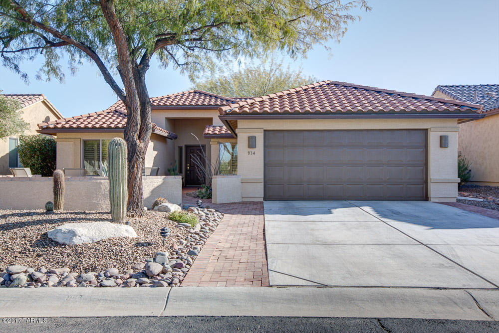IF BANG FOR YOUR BUCK (under $215,000) is what you are looking for, look no further.   Recently painted inside and out, update to entertainment center to allow for a flat screen TV, new appliances (gas stove, fridge, dishwasher, microwave, gas dryer, washer), custom wood shutters throughout house, new light fixtures in master, kitchen counter drop down lights and in both bathrooms, new Moen  faucet at kitchen sink, new water saving toilets in both bathrooms, new carpeting in both bedrooms.  Exterior has fabulous front patio (SUNSET VIEWS).  Rear patio  has french drain installed,inline gas BBQ added to back deck and 220 amp power at the same time, rain gutters, new water softener and termite contract with Bill's Home Services.