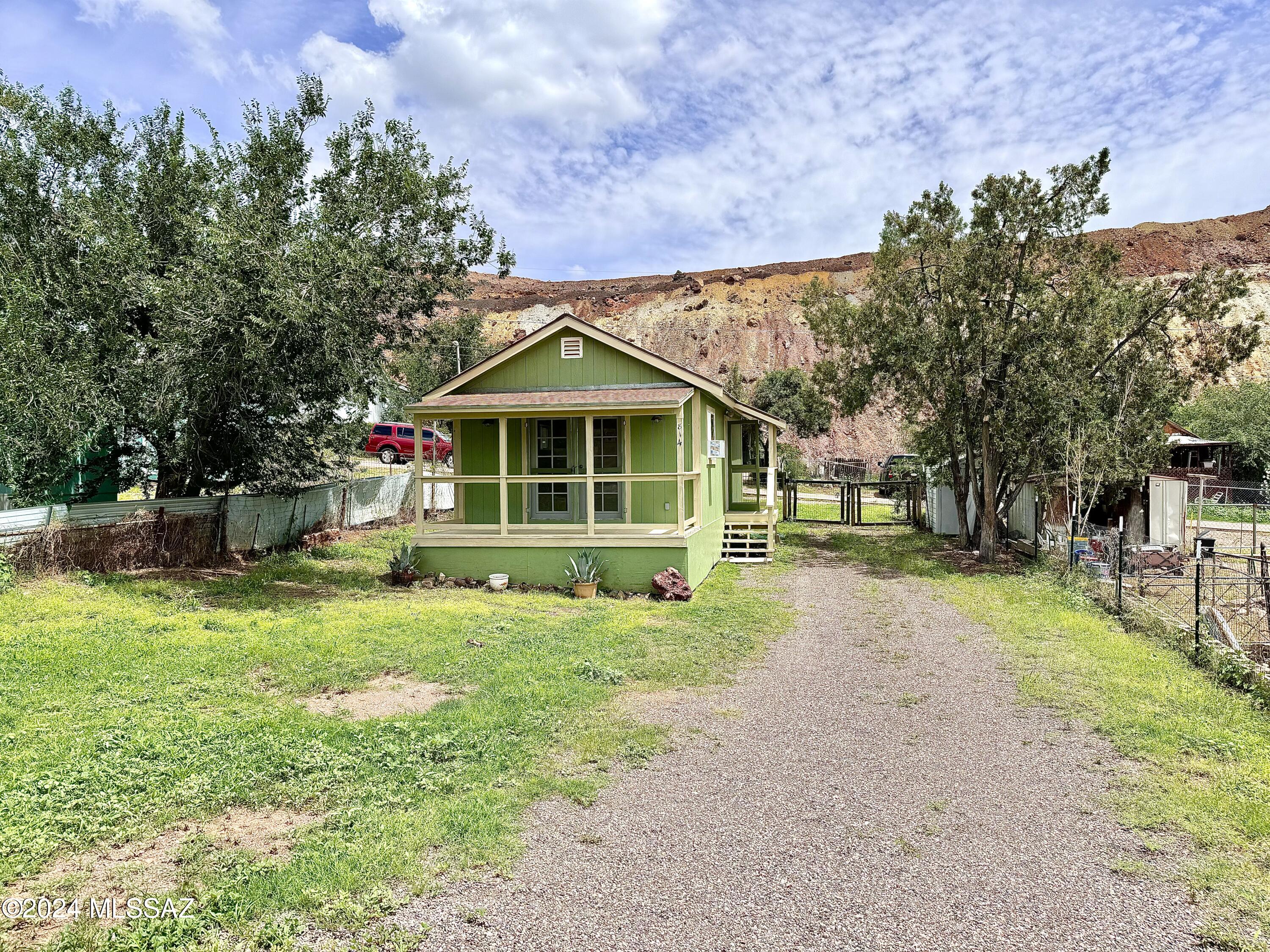 Beautifully maintained renovated and rebuilt miner's changing house! This house was stripped down to the bones and updated in 2007. With fresh paint inside and out, this property is ready for a personalized touch! Take advantage of the large front yard with plenty of room to park RVs and other toys! This little piece of Bisbee offers access to shopping and restaurants within 5 to 10 minutes of driving!