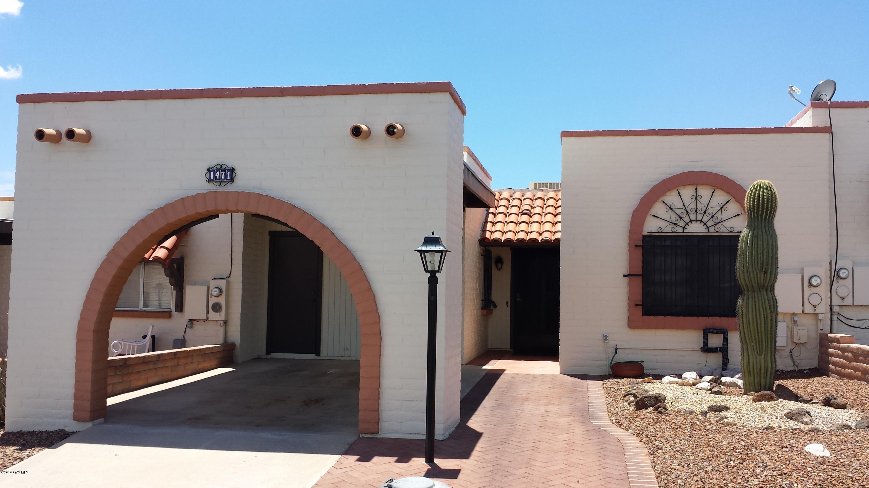Beautifully maintained 1165 sq ft townhome. 2BR, 2BA home that makes a great vacation or permanent home. Eat-in kitchen & formal dining. Newer full size washer/dryer & fridge. Roll down sunshade on patio. Workshop! Storage! Master has Premier walk-in tub. New HVAC approx. 2011. New water heater 2015. Roof recoat approx. 2013.